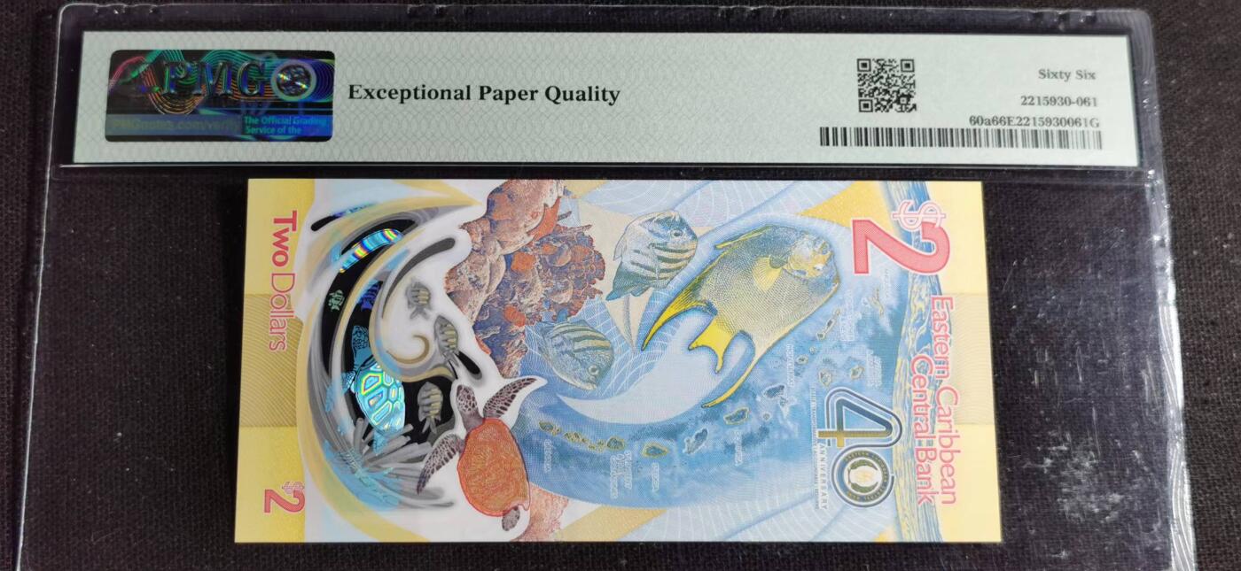 刘世昌艺术品销售中心～虎踞龙蟠*金杨在线联拍群第513期 东加勒比2023年2元（PMG   66E    号码：AA695722）1枚。此币荣获当年IBNS大奖赛“最佳纸币”大奖。