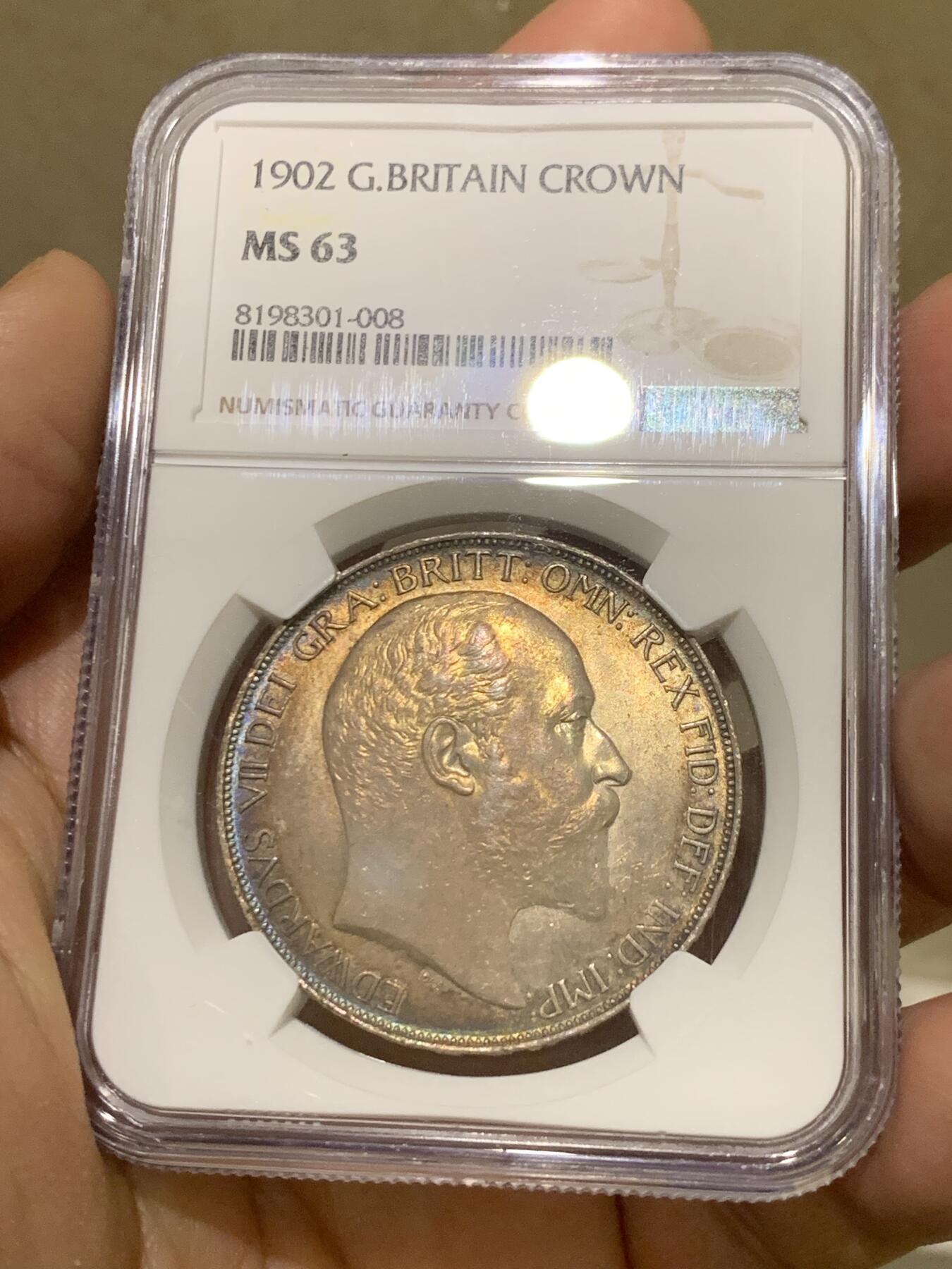 《竞宝斋》第370场 周日，周一 2场连拍 （全场包邮） NGC MS63 英国1902年爱德华七世马剑克朗 双面欧洲五彩包浆过于美丽 值得珍藏