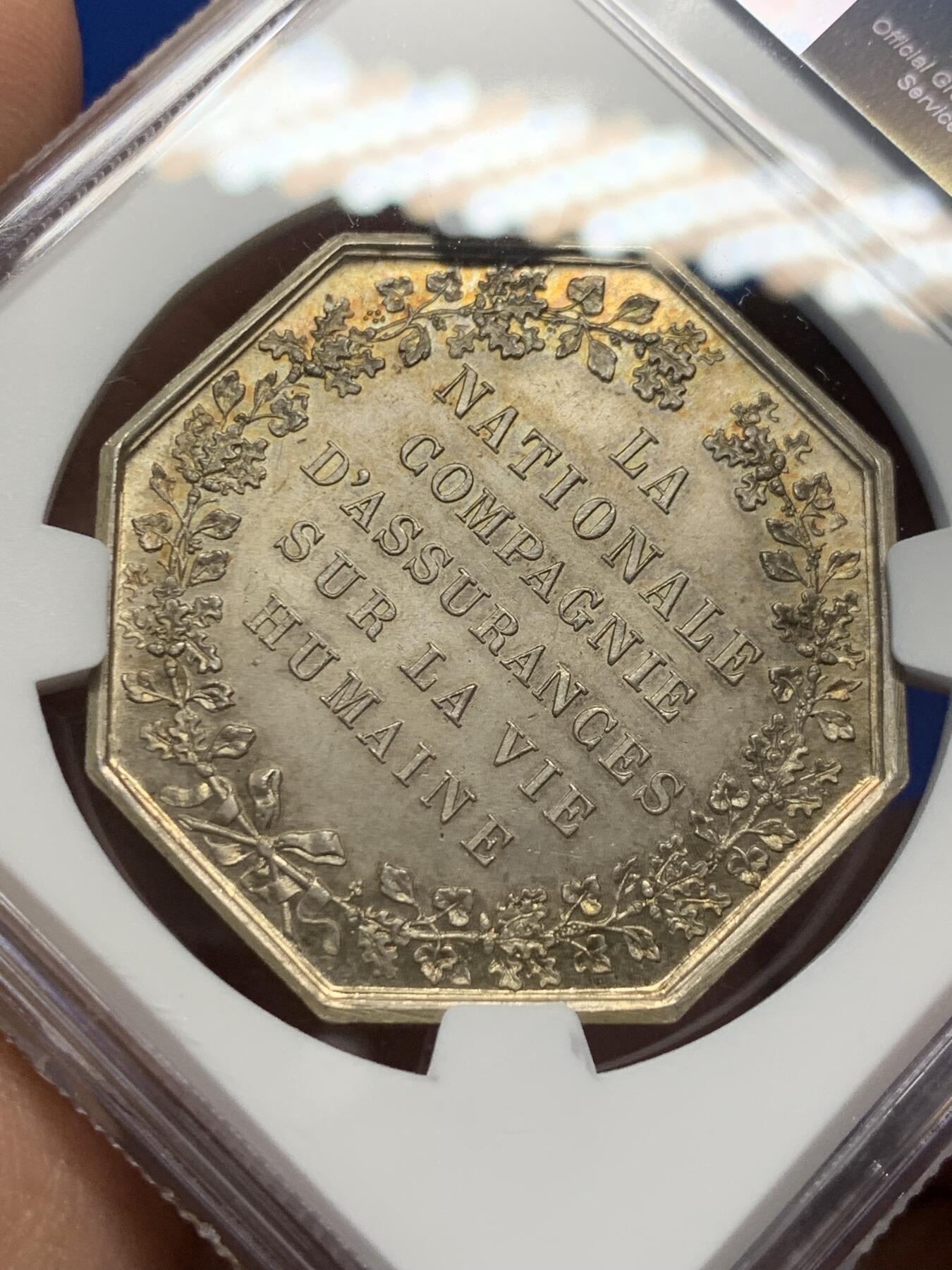 《竞宝斋》第370场 周日，周一 2场连拍 （全场包邮） NGC MS64 法国 La Nationale 国家人寿保险公司八角银质代币  高分 好状态