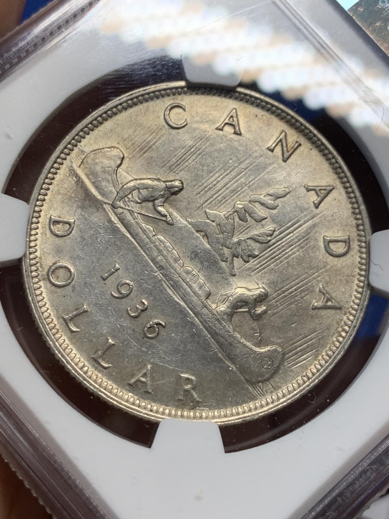 《竞宝斋》第370场 周日，周一 2场连拍 （全场包邮） NGC AU55 加拿大1936年乔五头像划船1元大银币