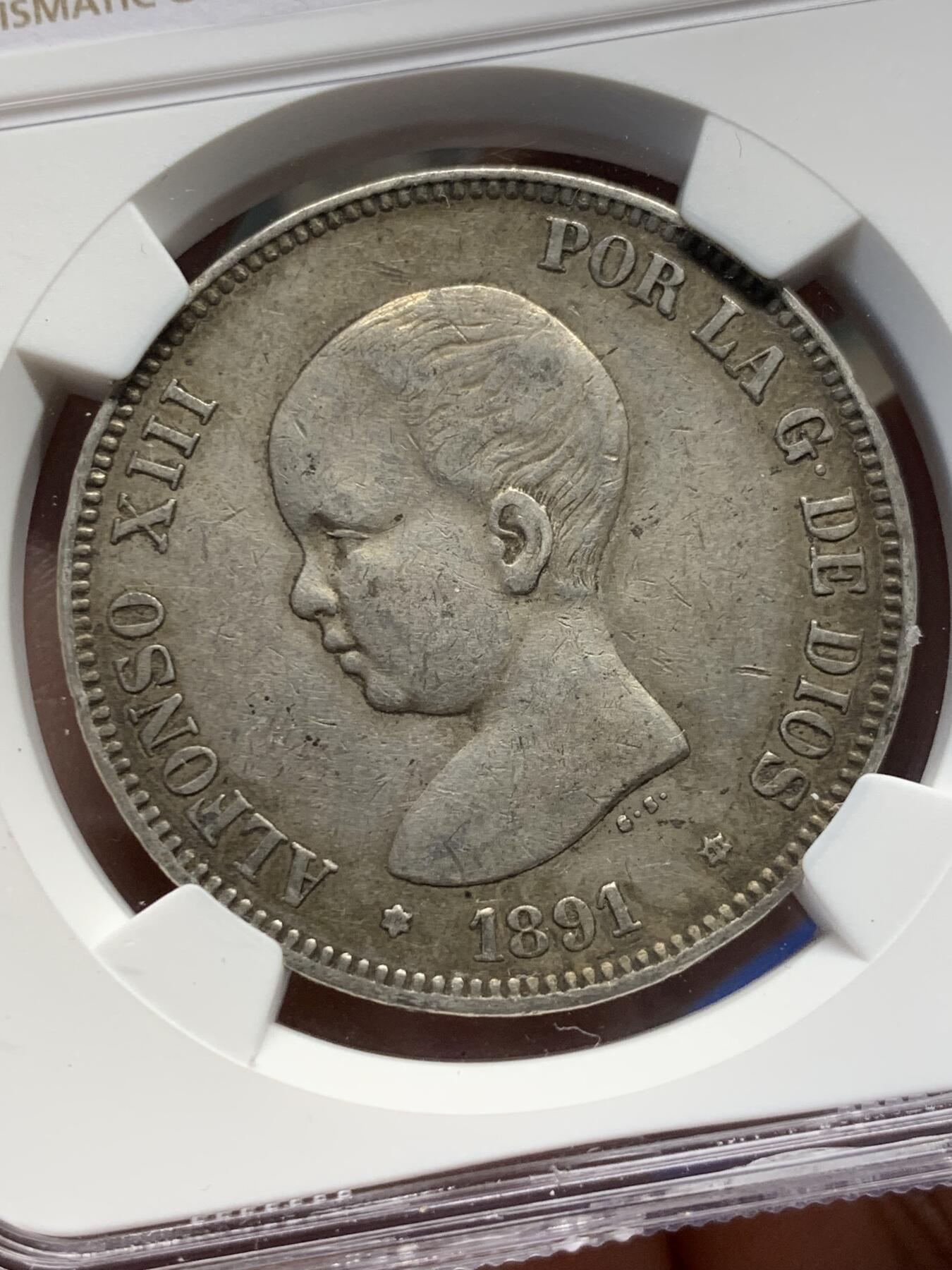 《竞宝斋》第370场 周日，周一 2场连拍 （全场包邮） NGC AU50 西班牙1891年阿方索十三世小光头版5比塞塔双柱银币