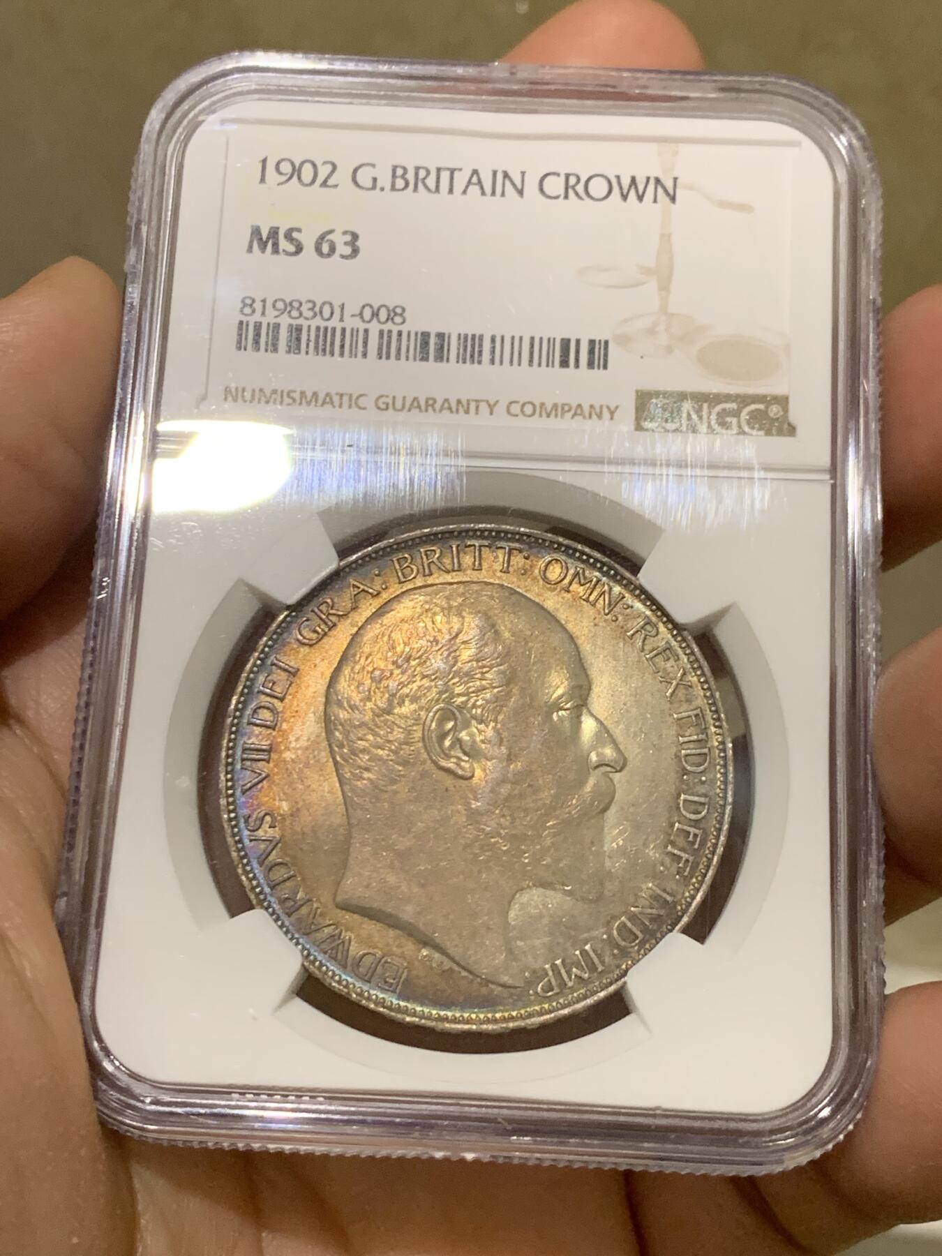 《竞宝斋》第370场 周日，周一 2场连拍 （全场包邮） NGC MS63 英国1902年爱德华七世马剑克朗 双面欧洲五彩包浆过于美丽 值得珍藏