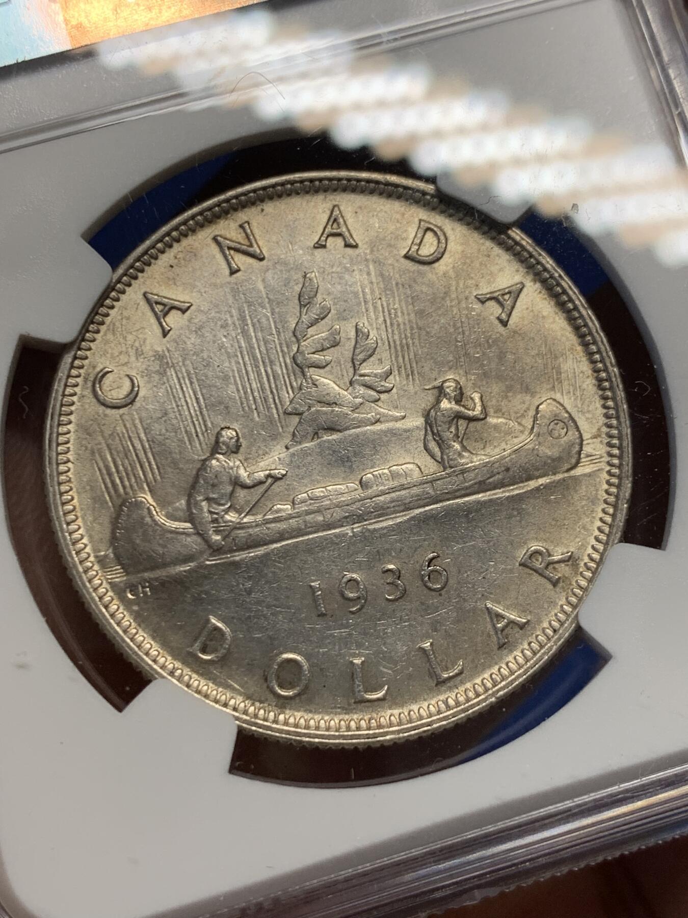 《竞宝斋》第370场 周日，周一 2场连拍 （全场包邮） NGC AU55 加拿大1936年乔五头像划船1元大银币