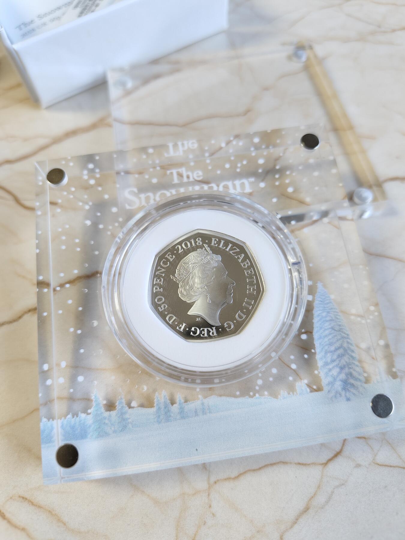 第168期拍卖【长期征集拍品】 【海寧潮】英国2018年圣诞雪人彩色多边形50便士精制纪念银币,925银，8克，发行15000枚
