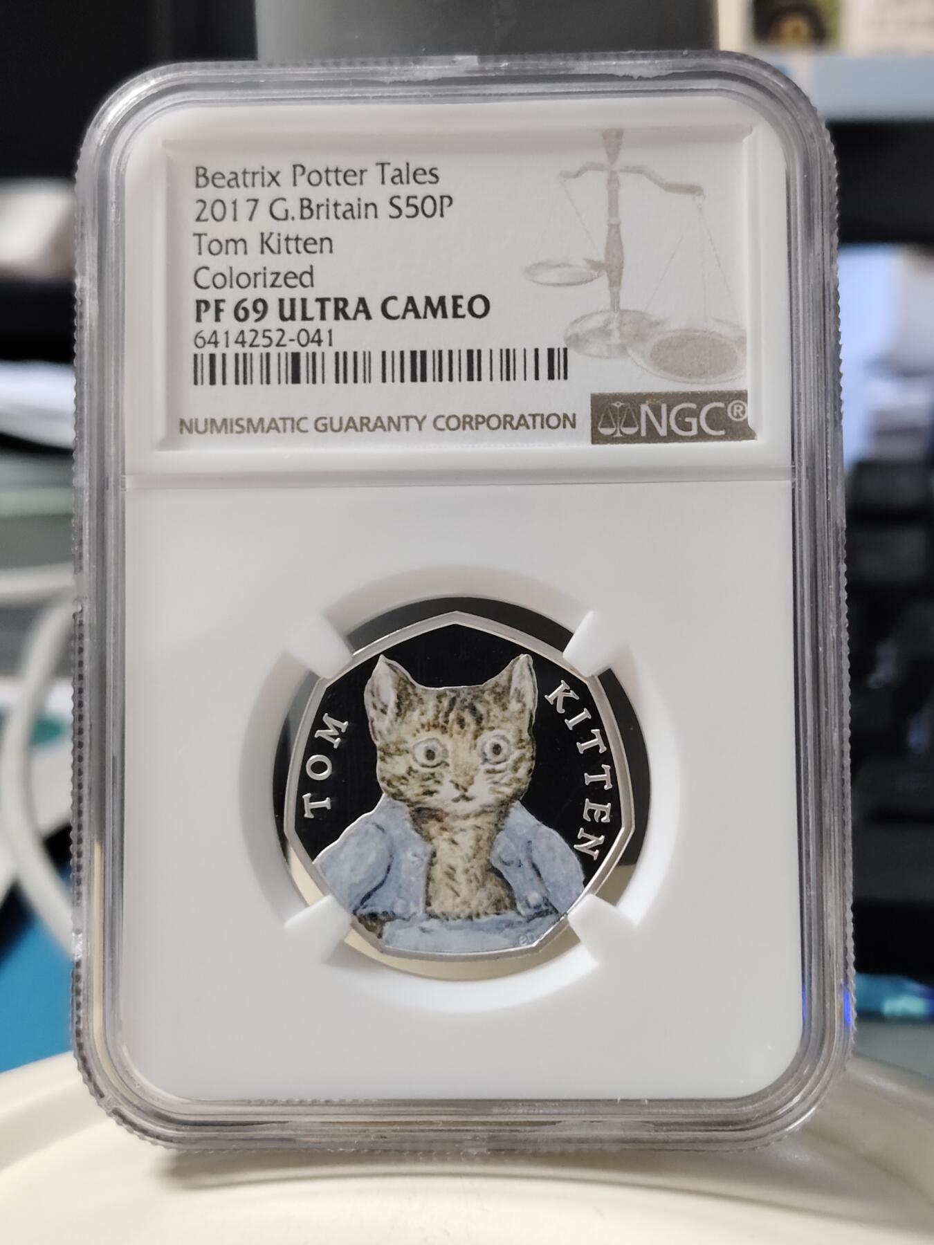 第168期拍卖【长期征集拍品】 英国2017年彼得兔系列汤姆小猫50便士纪念彩银币NGC-PF69原盒证书，8克，925银，发行30000枚