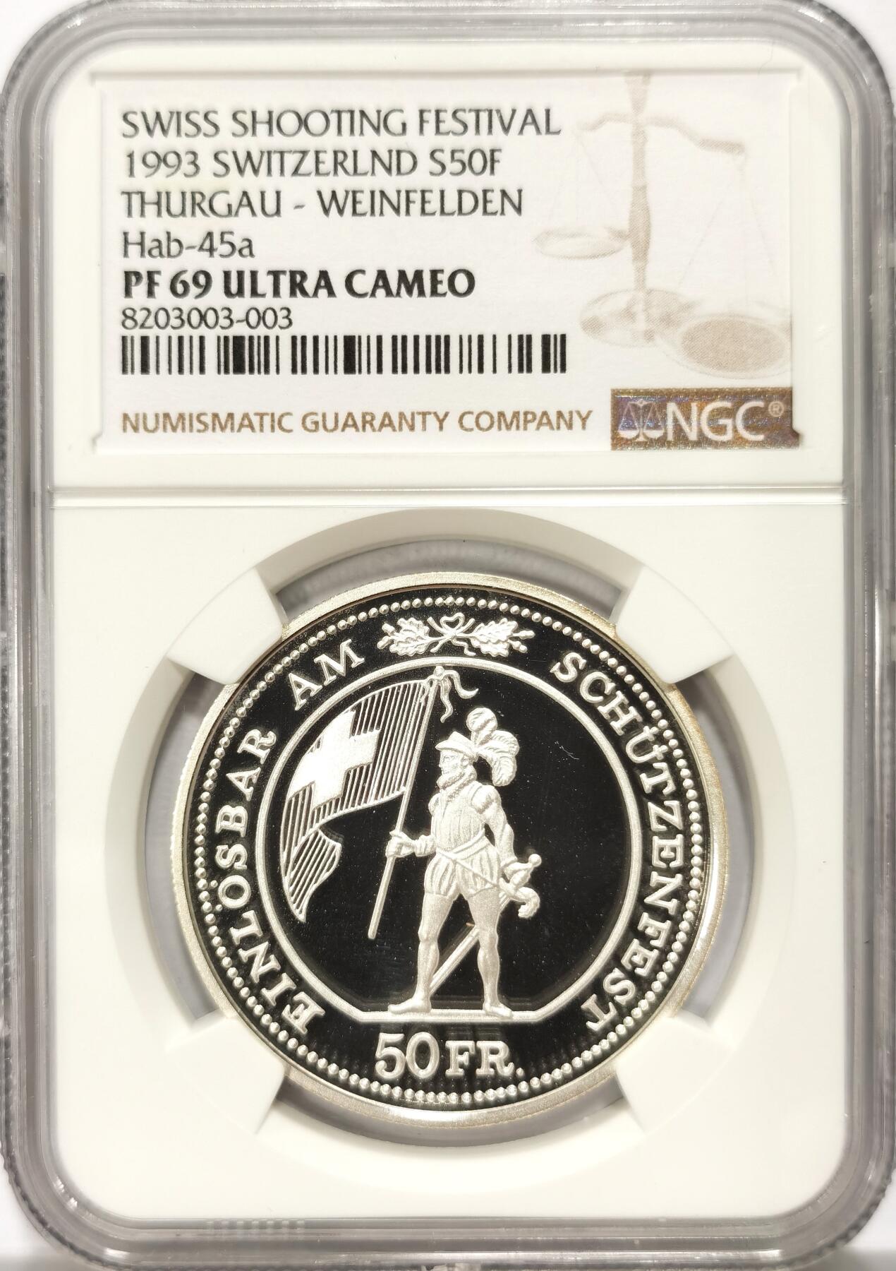 博洋堂世界钱币拍卖第118期（全场包邮） 1993年瑞士图尔高-韦因费尔登射击节50法郎精制银币NGC-PF69UC，直径37mm，重25g，发行量2000枚。PROOF精制币，打制深峻，转光强烈细节优秀，币面清爽干净又漂亮，状态一流，顶级高分。