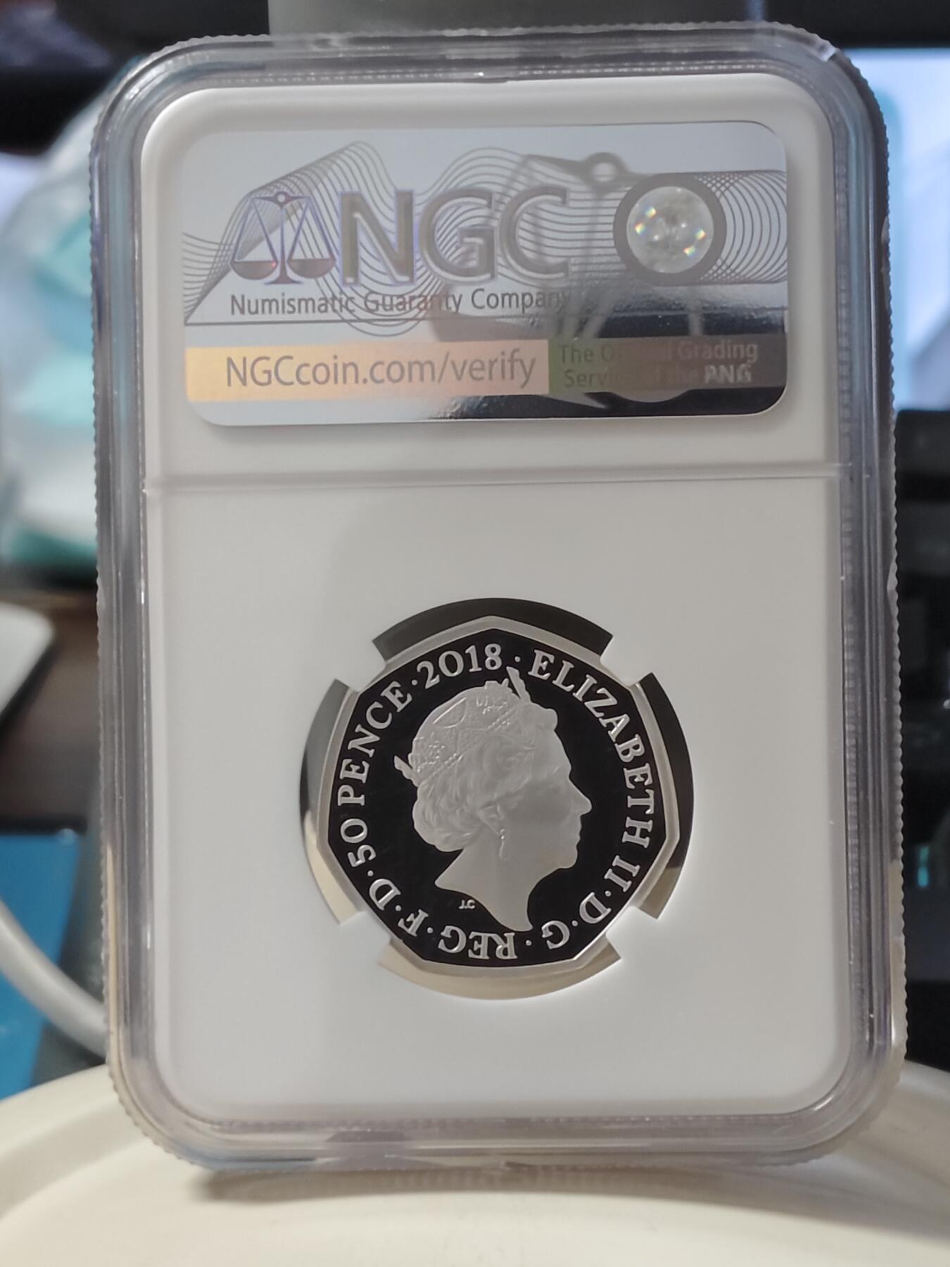 第168期拍卖【长期征集拍品】 英国2018年可爱帕丁顿熊系列在火车站彩色纪念银币NGC-PF70原盒证书，925银，8克，发行60000枚