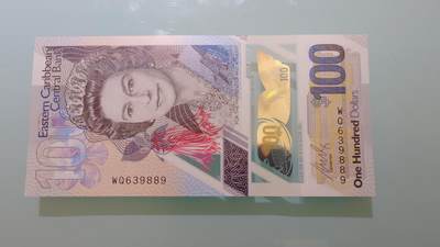 【世界钱币】精选微拍第174期暨2025年第13期  近期卖剩新品上架专场（一） 【一口价已售出】2022年东加勒比100元 塑料钞全新绝品无47尾号8883（非图片所示号码）