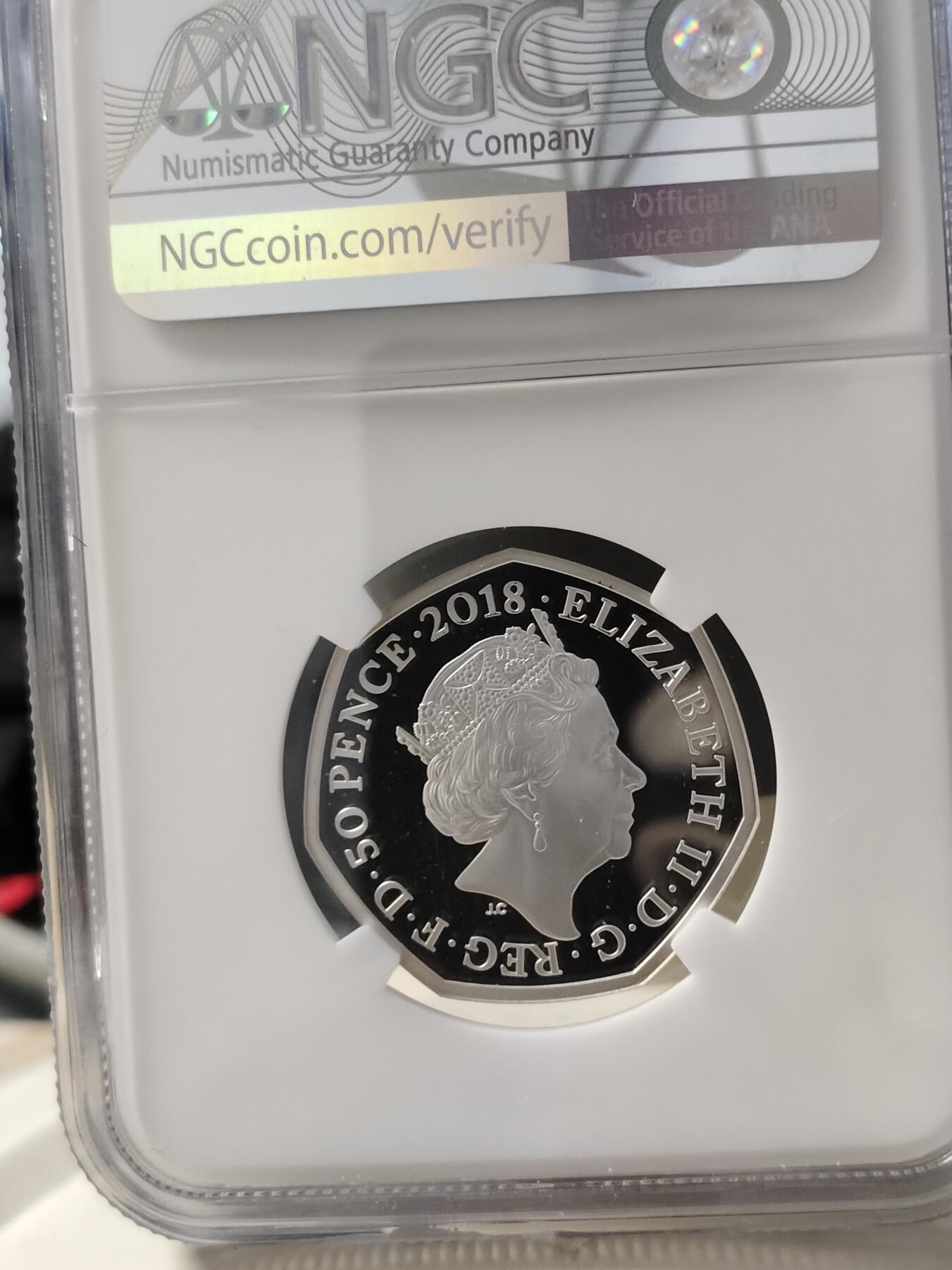 第168期拍卖【长期征集拍品】 英国2018年彼得兔系列彼得兔50便士彩色银币NGC-PF69原盒证书，925银，8克，发行35000枚