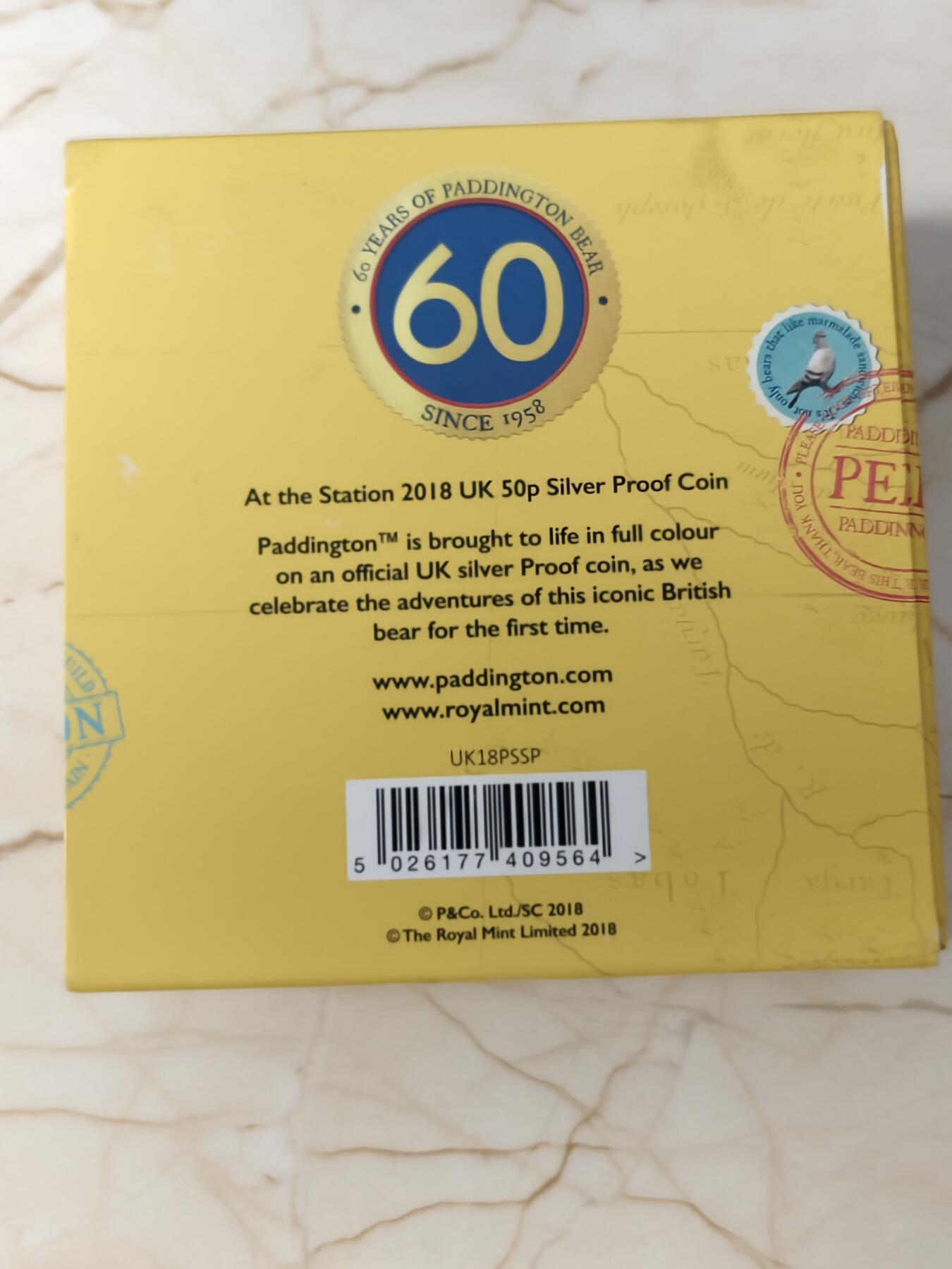 第168期拍卖【长期征集拍品】 英国2018年可爱帕丁顿熊系列在火车站彩色纪念银币NGC-PF70原盒证书，925银，8克，发行60000枚