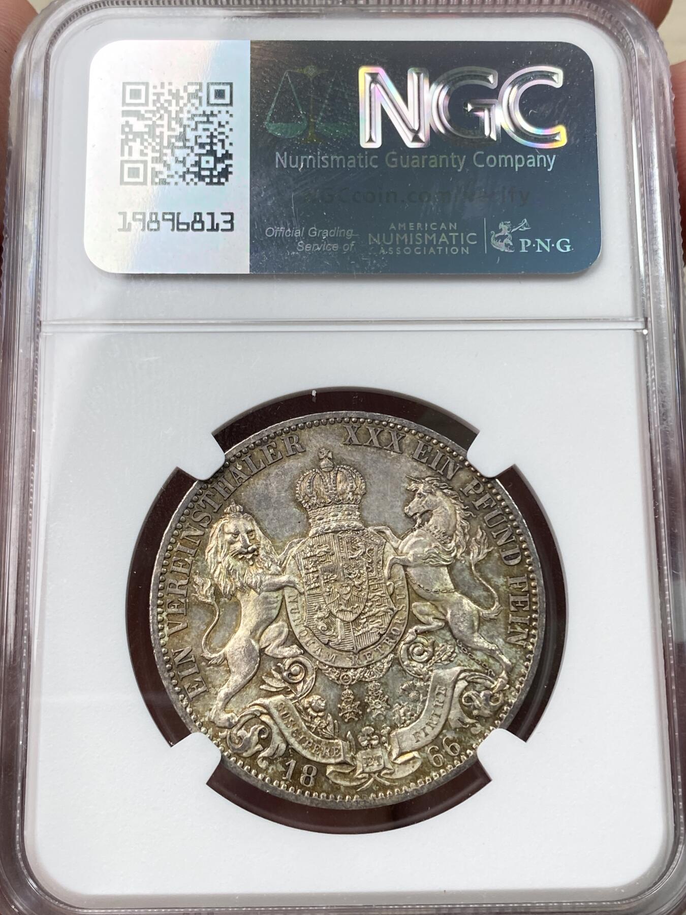 万国钱币拍卖第045期（万国春季大拍） NGC MS64 1866年德国汉诺威格奥尔格五世狮马流通1泰勒 汉诺威最后的流通泰勒 经典狮马盾徽 底板类镜面质感 原味五彩加持