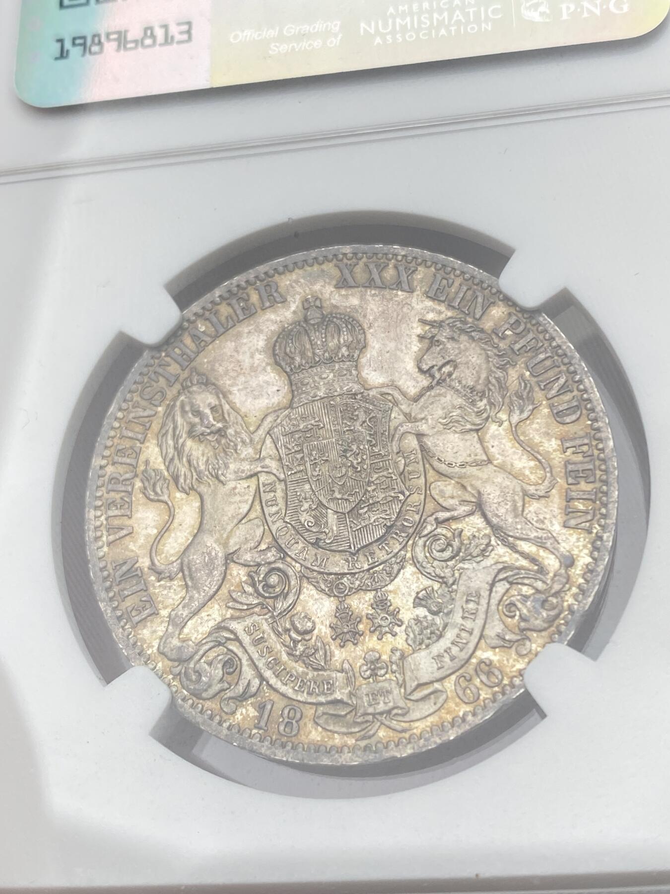 万国钱币拍卖第045期（万国春季大拍） NGC MS64 1866年德国汉诺威格奥尔格五世狮马流通1泰勒 汉诺威最后的流通泰勒 经典狮马盾徽 底板类镜面质感 原味五彩加持