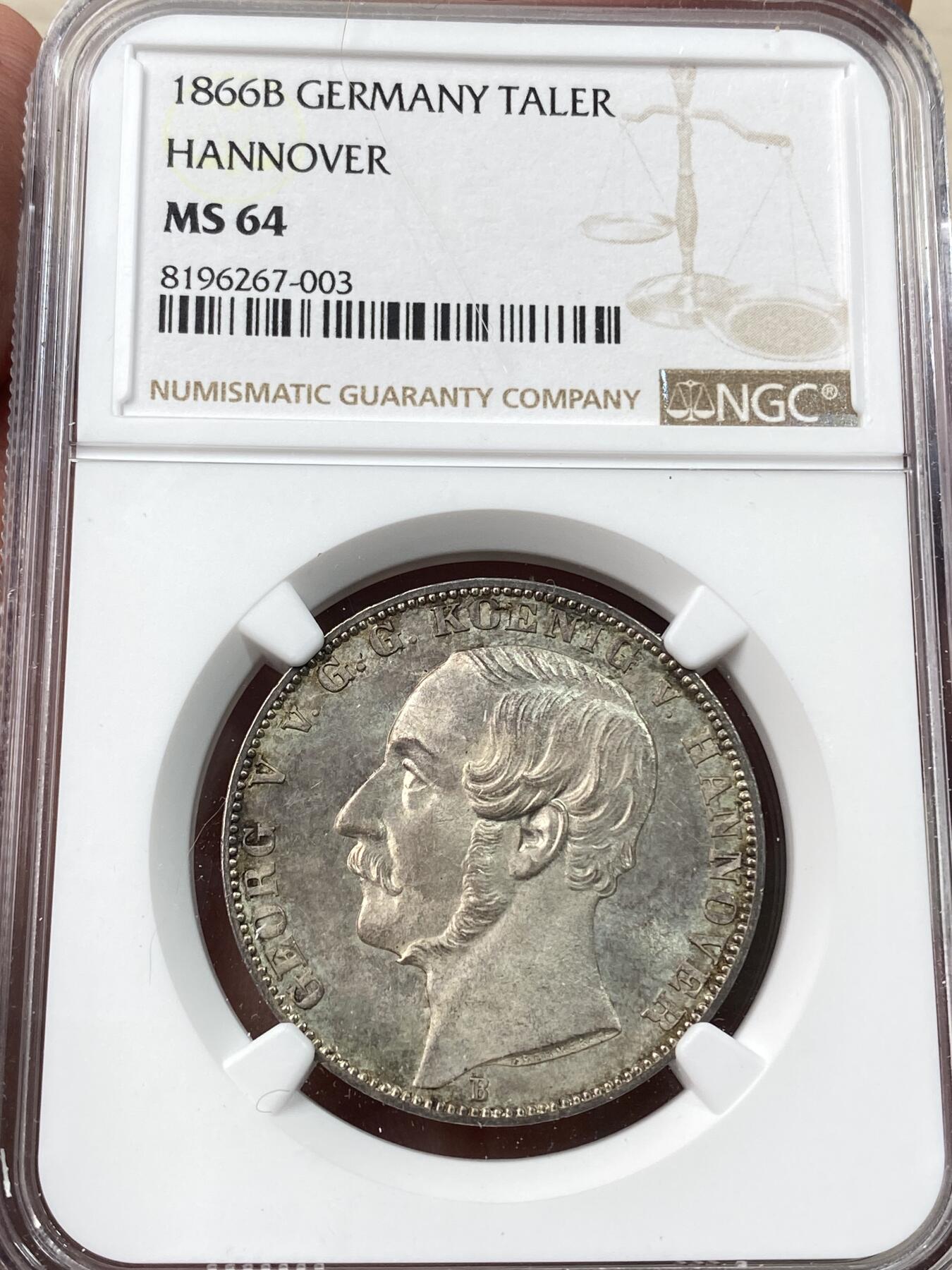万国钱币拍卖第045期（万国春季大拍） NGC MS64 1866年德国汉诺威格奥尔格五世狮马流通1泰勒 汉诺威最后的流通泰勒 经典狮马盾徽 底板类镜面质感 原味五彩加持