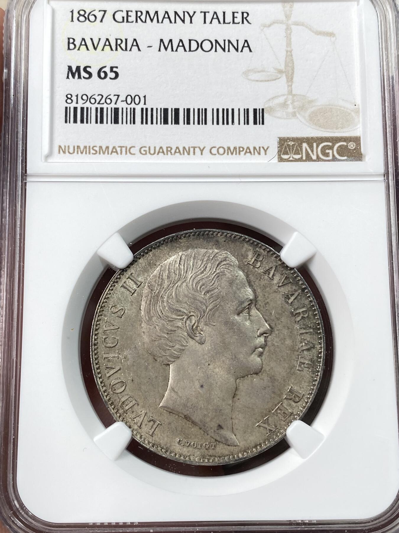 万国钱币拍卖第045期（万国春季大拍） NGC MS65 1867年德国巴伐利亚路德维希二世圣母抱婴流通1泰勒 顶级欧洲原味五彩 青灰色包浆也遮掩不住底板迸发出的原始光芒 顶级收藏品质