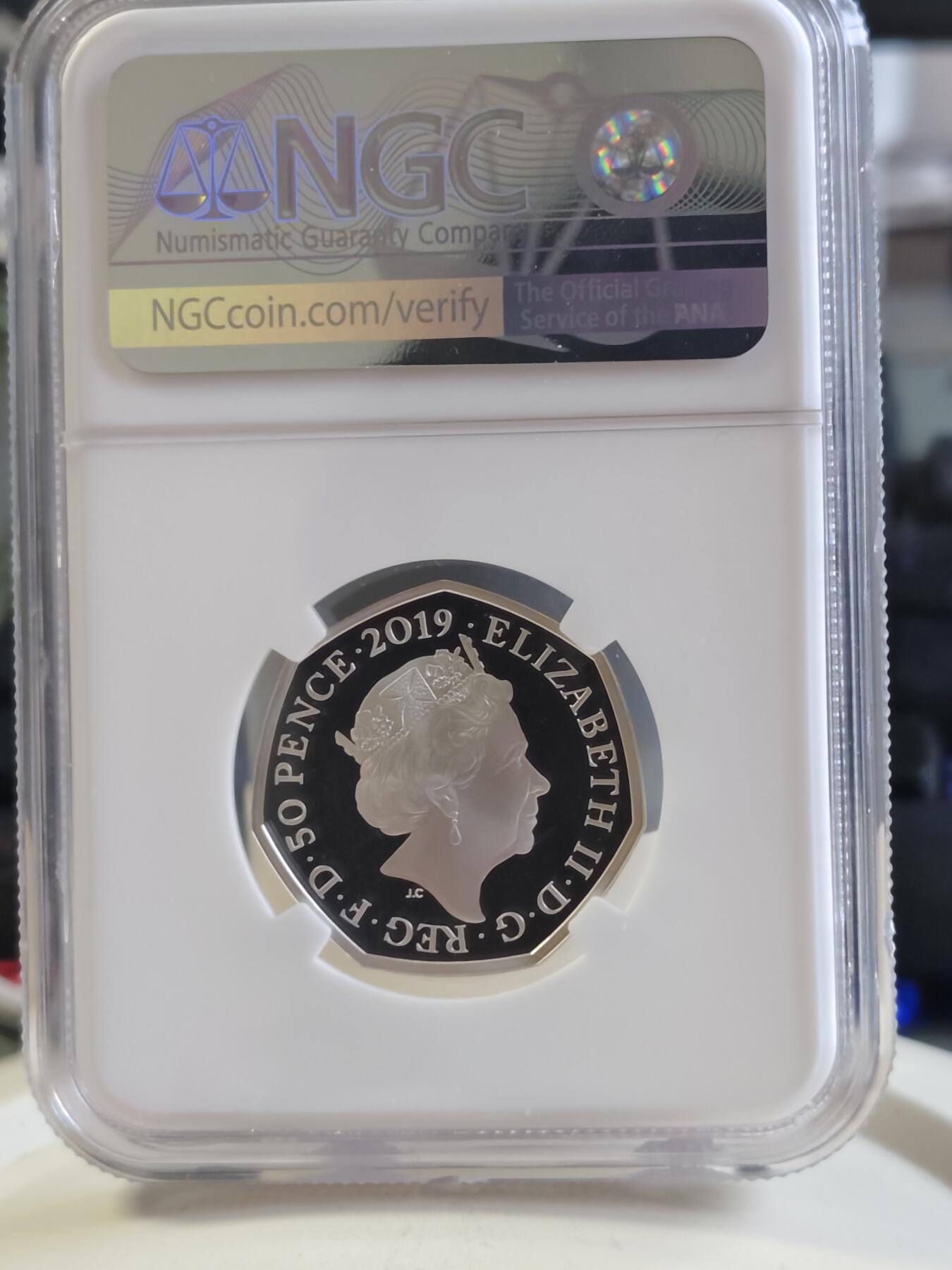 第168期拍卖【长期征集拍品】 英国2019年童话动物系列咕噜牛50便士纪念彩银币NGC-PF69原盒证书，925银，8克，发行量30000枚