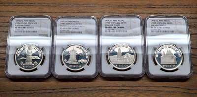 凡希社世界钱币微拍第三百零一期 - 1984中国古塔纪念银章四枚套，NGC-PF69UC，纯银版，顶级品相，早期精品官方章，附上造厂木质锦盒。（视频参考）