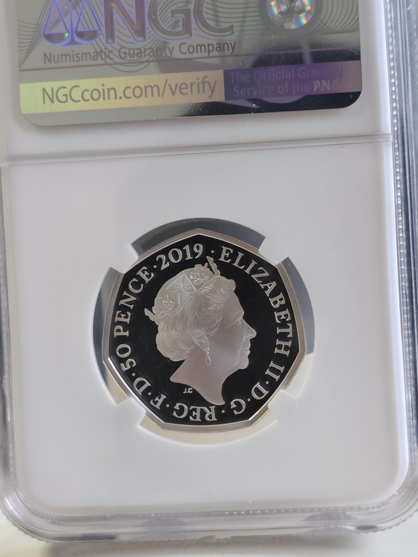 第168期拍卖【长期征集拍品】 英国2019年童话动物系列咕噜牛50便士纪念彩银币NGC-PF69原盒证书，925银，8克，发行量30000枚