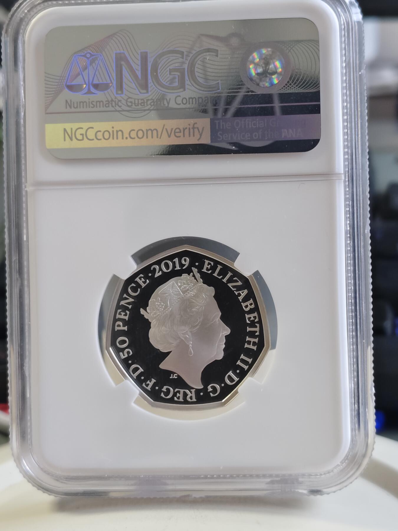 第168期拍卖【长期征集拍品】 英国2019年童话动物系列咕噜牛50便士纪念彩银币NGC-PF69原盒证书，925银，8克，发行量30000枚