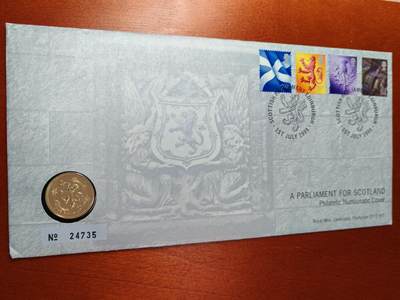 长老汇马年精选第九场拍卖 - 1999英国苏格兰狮子邮币封首日封，含同名1镑铜镍币1枚，英文说明纸