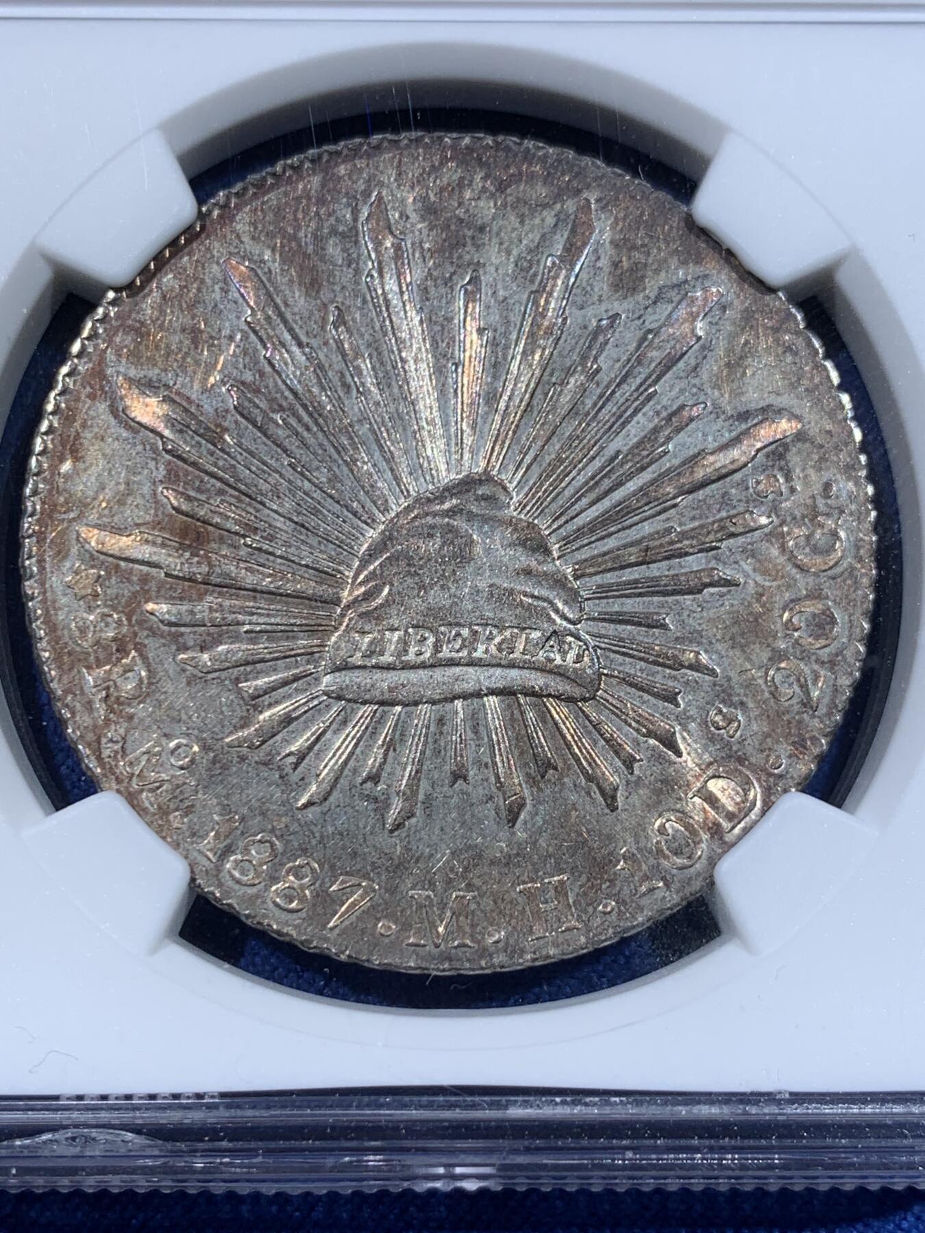 《竞宝斋》第372场 周日，周一 2场连拍 （全场包邮） NGC MS63 墨西哥 1887年 8瑞尔 花边鹰洋 银币 底板PL感很好 搭配上紫色包浆 相得益彰