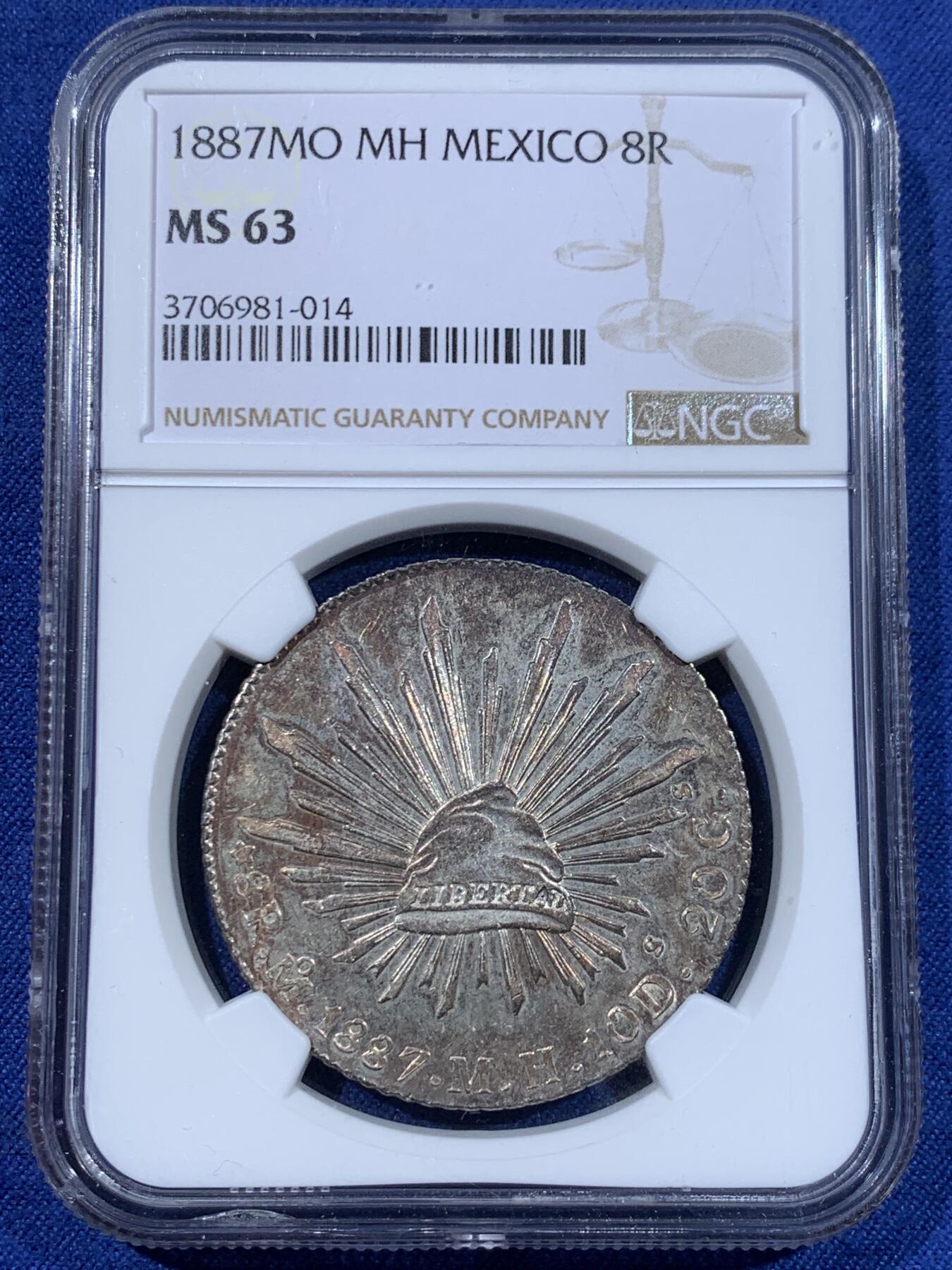 《竞宝斋》第372场 周日，周一 2场连拍 （全场包邮） NGC MS63 墨西哥 1887年 8瑞尔 花边鹰洋 银币 底板PL感很好 搭配上紫色包浆 相得益彰