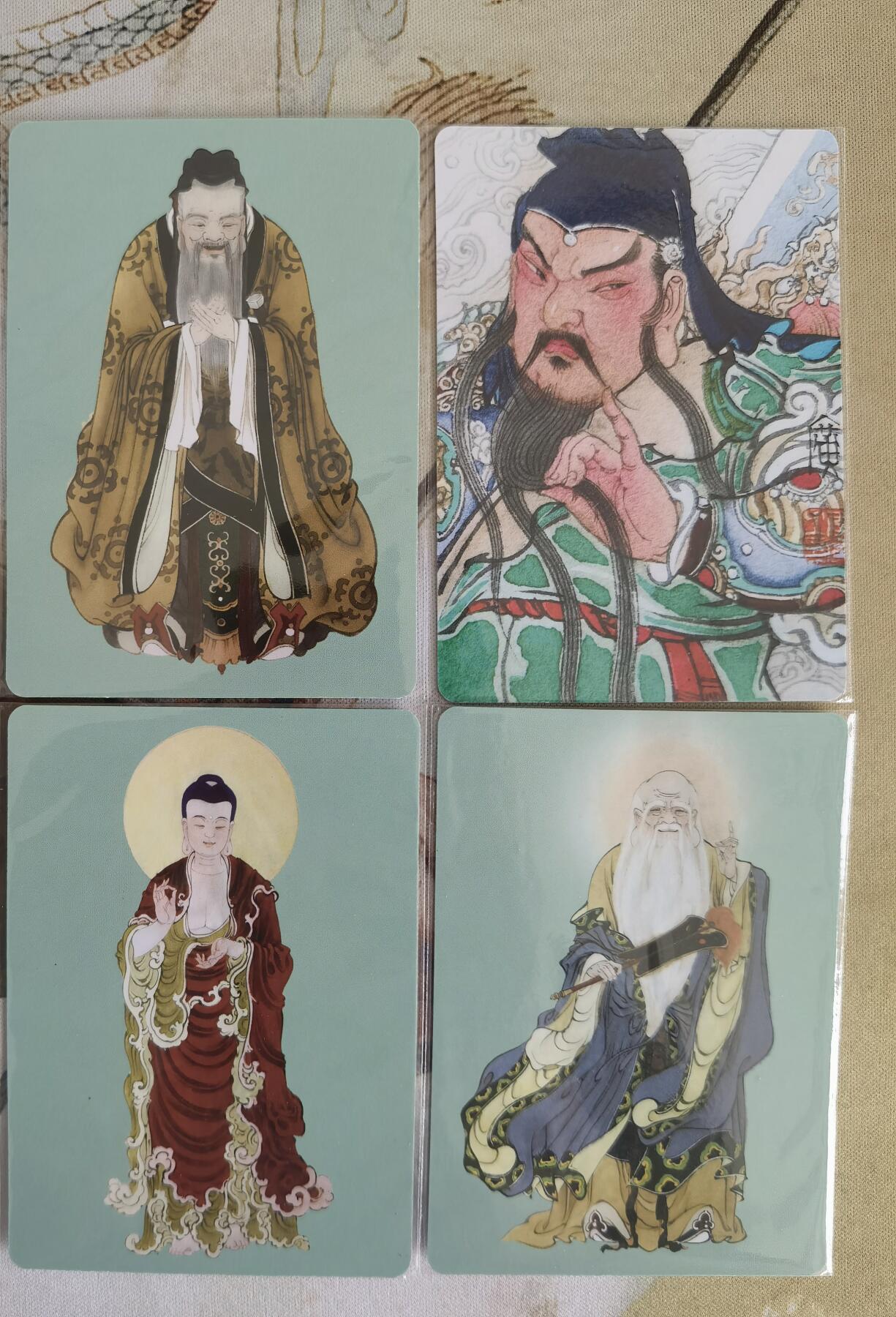 奇趣收藏卡牌拍卖第13场 广绘经典 李广绘 普卡4张 释迦牟尼 孔子 老子 关公  已套卡膜