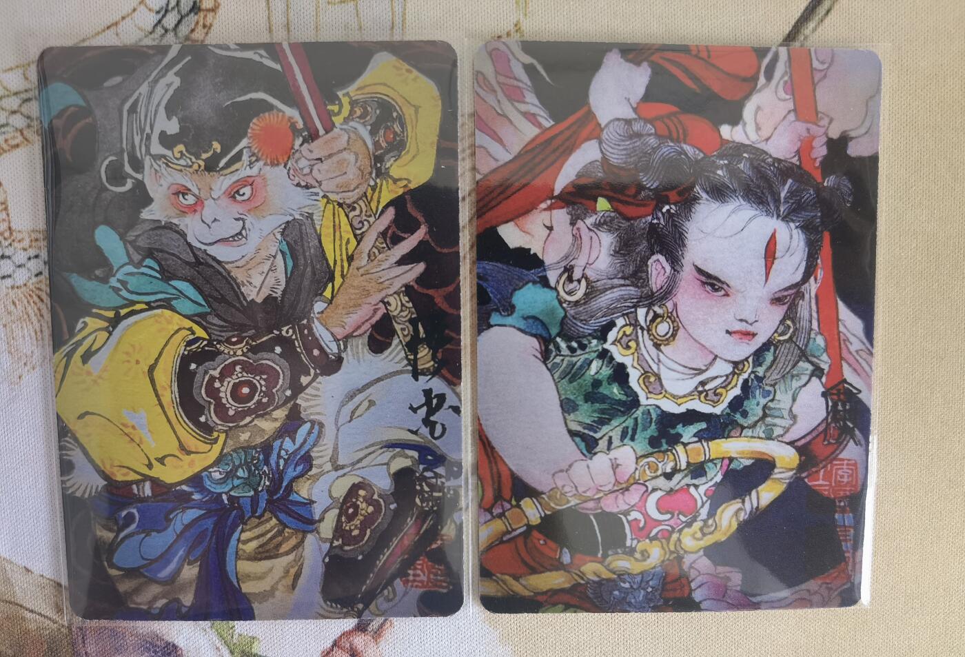 奇趣收藏卡牌拍卖第13场 广绘经典 李广绘 孙悟空+哪吒普卡各1张  已套卡膜