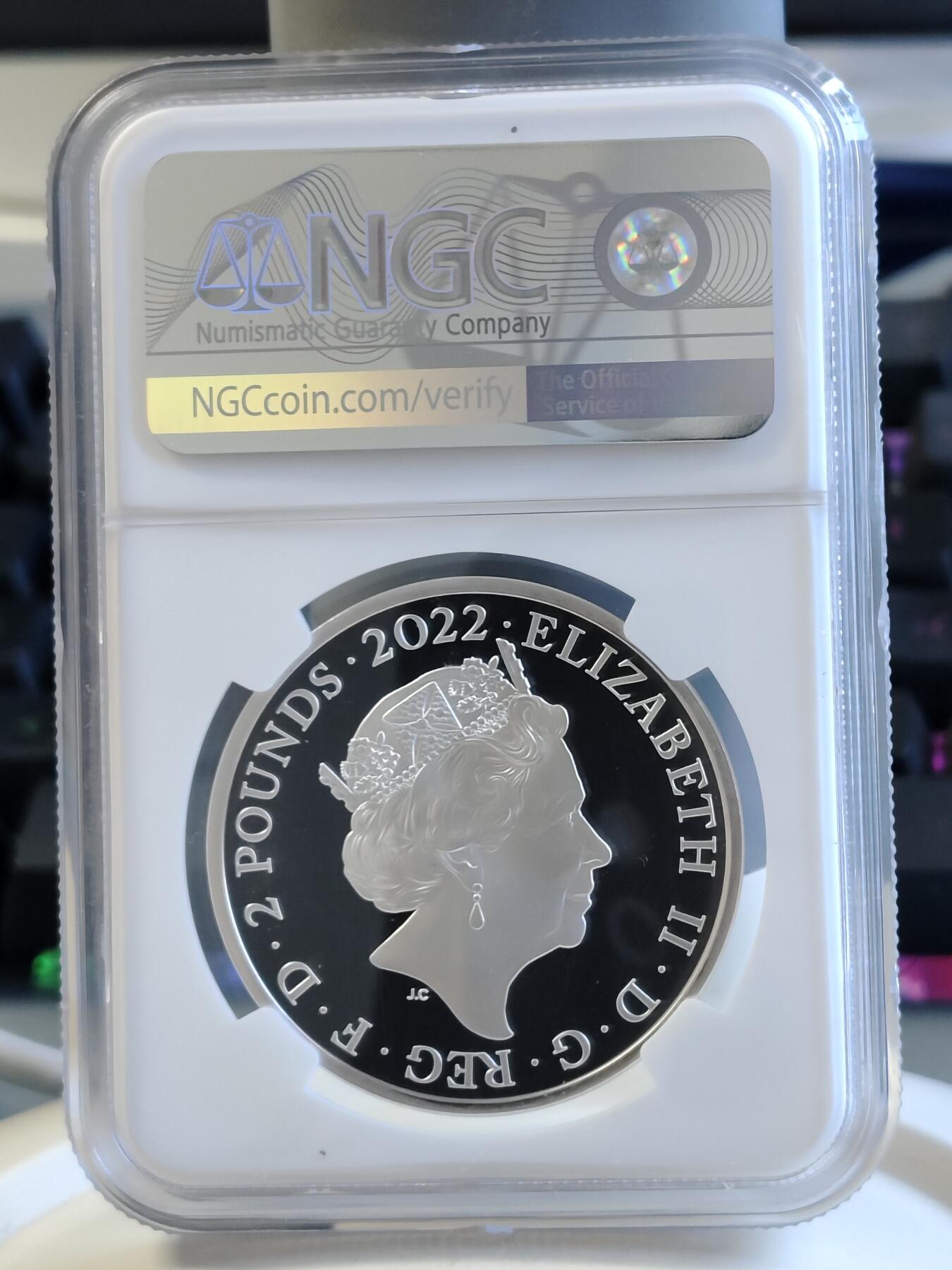 第168期拍卖【长期征集拍品】 英国2022年发行哈利波特出版25周年2英镑精制纪念银币NGC-PF69原盒证书，999银，发行15000枚
