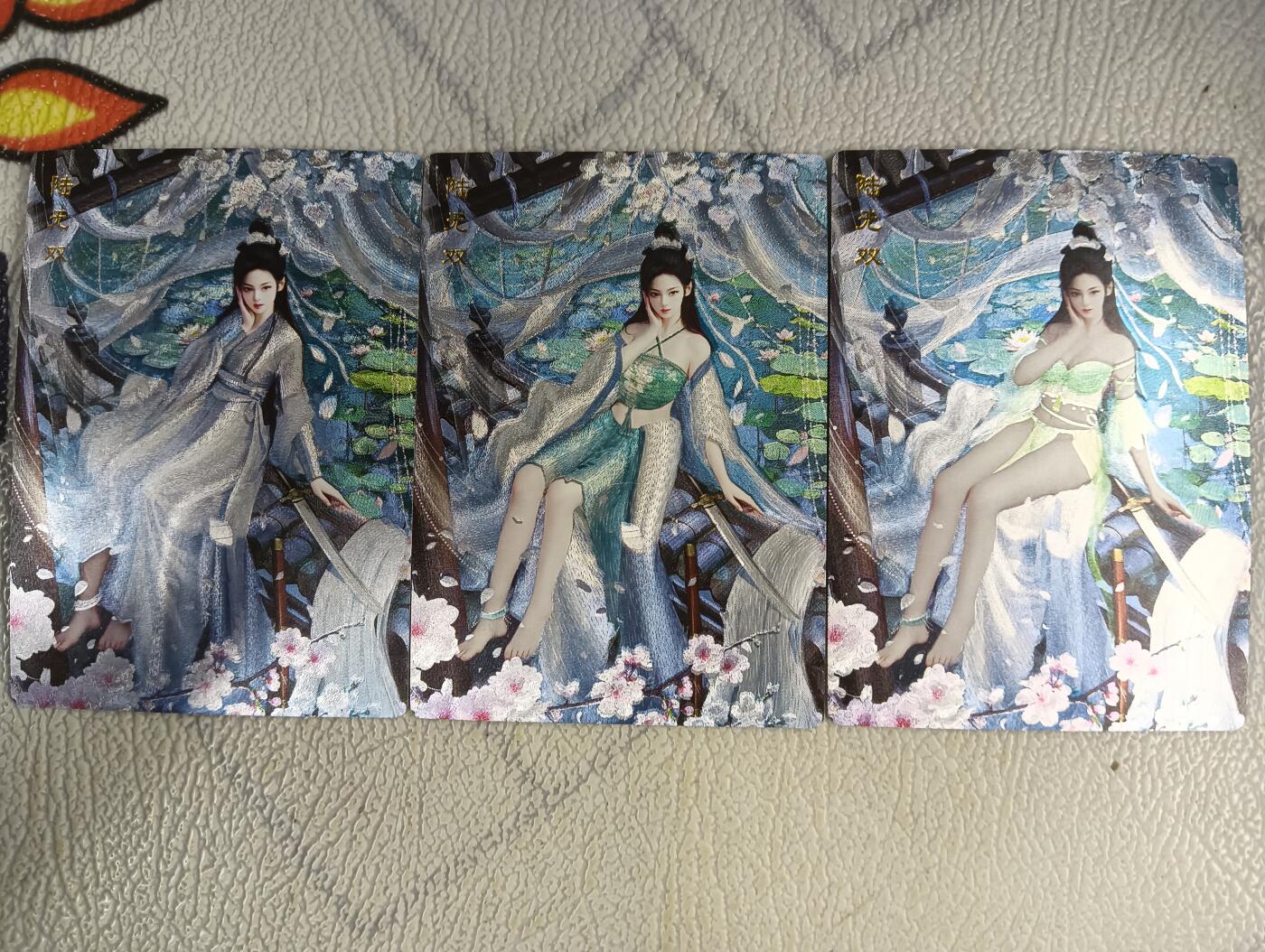花开卡拍第十八期（收拍品，无佣金，不寄存，自制卡难免瑕疵，可能存在撞角爆边等出厂瑕疵，品控介意勿拍！） 桔梗神凰百剑行 陆无双 粗闪三渐变