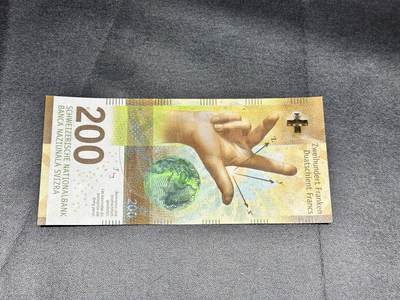 《外钞收藏家》第五百一十四期（精美套币、牛货场）（长期征集拍品、欢迎联系） - 2016年瑞士手版200法郎 全新UNC 尾33