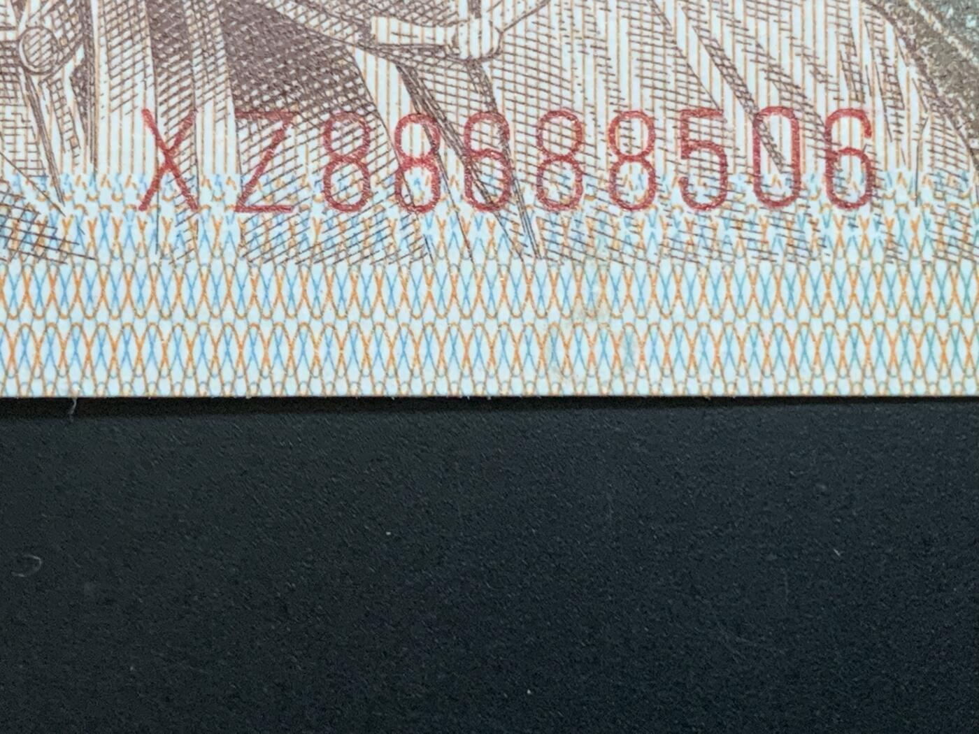汇源轩收藏35期25.11.7 【 趣味油墨瑕疵币“耳锤”，金马号】8001  XZ88688506  裸币，两边有边捆荧，喜欢的不要错过，绝品无斑。
