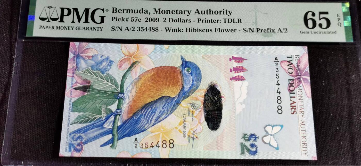 刘世昌艺术品销售中心～虎踞龙蟠*金杨在线联拍群第514期 百慕大2009年2元（PMG 65E 号码：A/2 354488）1枚。此币荣获当年IBNS世界纸币大奖赛“最佳纸币”大奖。