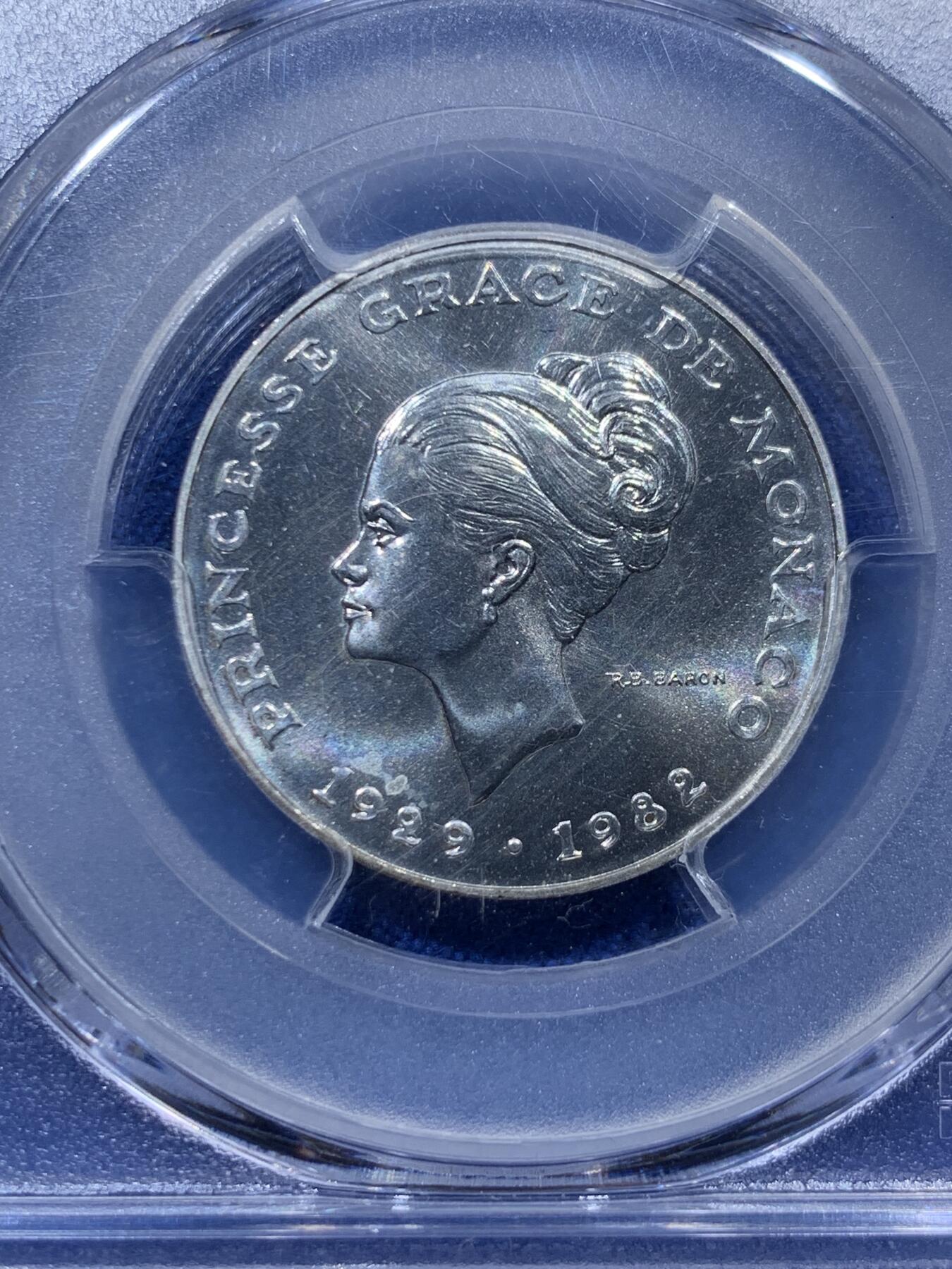 《竞宝斋》第373场 周日，周一，周二 3场连拍 （全场包邮） PCGS SP68 摩纳哥1982年格蕾丝王妃10法郎银样币，标注ESSAI。格蕾丝.凯莉，奥斯卡影后，风华绝代的传奇王妃。此银样很难出顶级分数，此枚68分为亚军分，更高分仅有2枚，平台此前上拍过的最高分仅有67