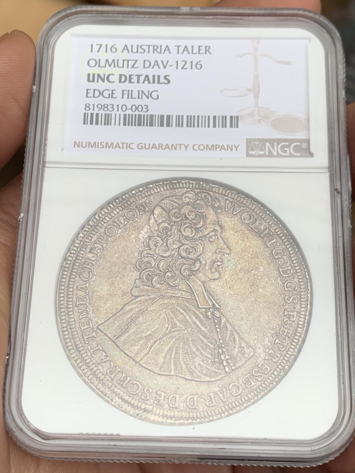 《竞宝斋》第373场 周日，周一，周二 3场连拍 （全场包邮） NGC UNC 神圣罗马帝国波西米亚王国奥尔穆茨主教区1716年泰勒大银币 币面打制清晰，高点具在，黑五彩包浆，单一年份  这个头像还是首见