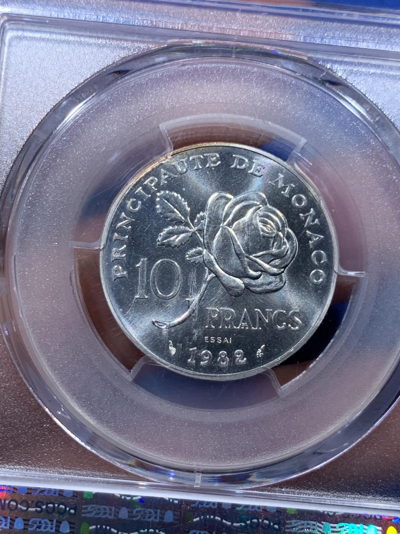 《竞宝斋》第373场 周日，周一，周二 3场连拍 （全场包邮） PCGS SP68 摩纳哥1982年格蕾丝王妃10法郎银样币，标注ESSAI。格蕾丝.凯莉，奥斯卡影后，风华绝代的传奇王妃。此银样很难出顶级分数，此枚68分为亚军分，更高分仅有2枚，平台此前上拍过的最高分仅有67