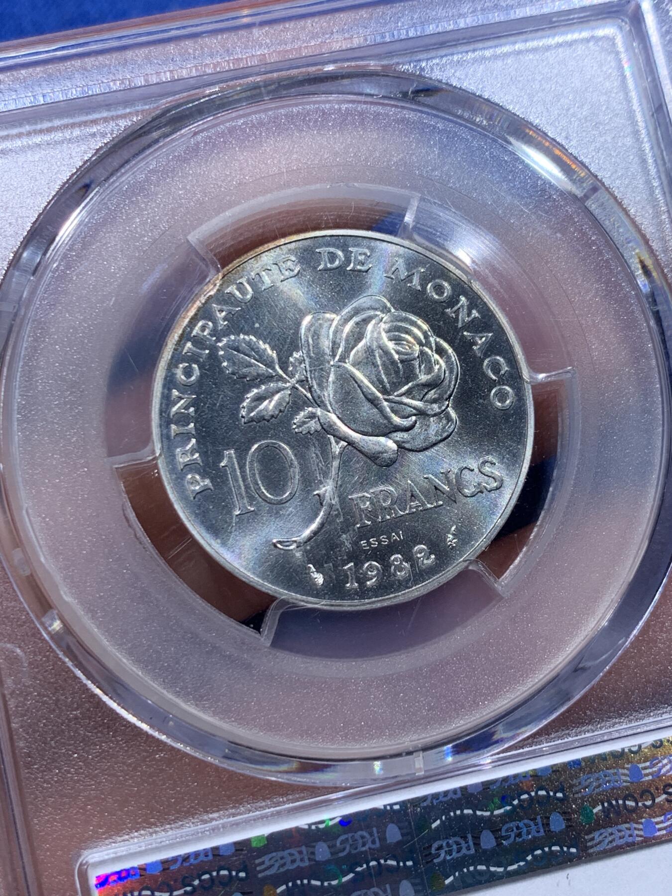 《竞宝斋》第373场 周日，周一，周二 3场连拍 （全场包邮） PCGS SP68 摩纳哥1982年格蕾丝王妃10法郎银样币，标注ESSAI。格蕾丝.凯莉，奥斯卡影后，风华绝代的传奇王妃。此银样很难出顶级分数，此枚68分为亚军分，更高分仅有2枚，平台此前上拍过的最高分仅有67