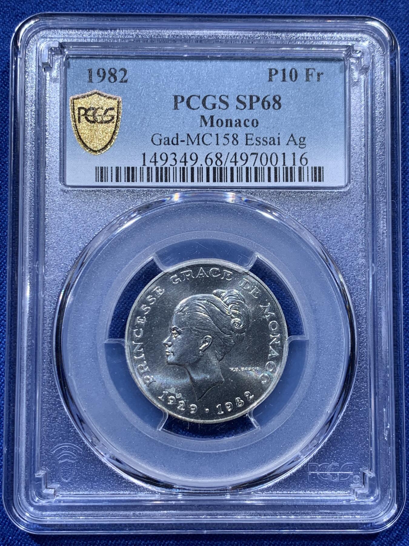 《竞宝斋》第373场 周日，周一，周二 3场连拍 （全场包邮） PCGS SP68 摩纳哥1982年格蕾丝王妃10法郎银样币，标注ESSAI。格蕾丝.凯莉，奥斯卡影后，风华绝代的传奇王妃。此银样很难出顶级分数，此枚68分为亚军分，更高分仅有2枚，平台此前上拍过的最高分仅有67