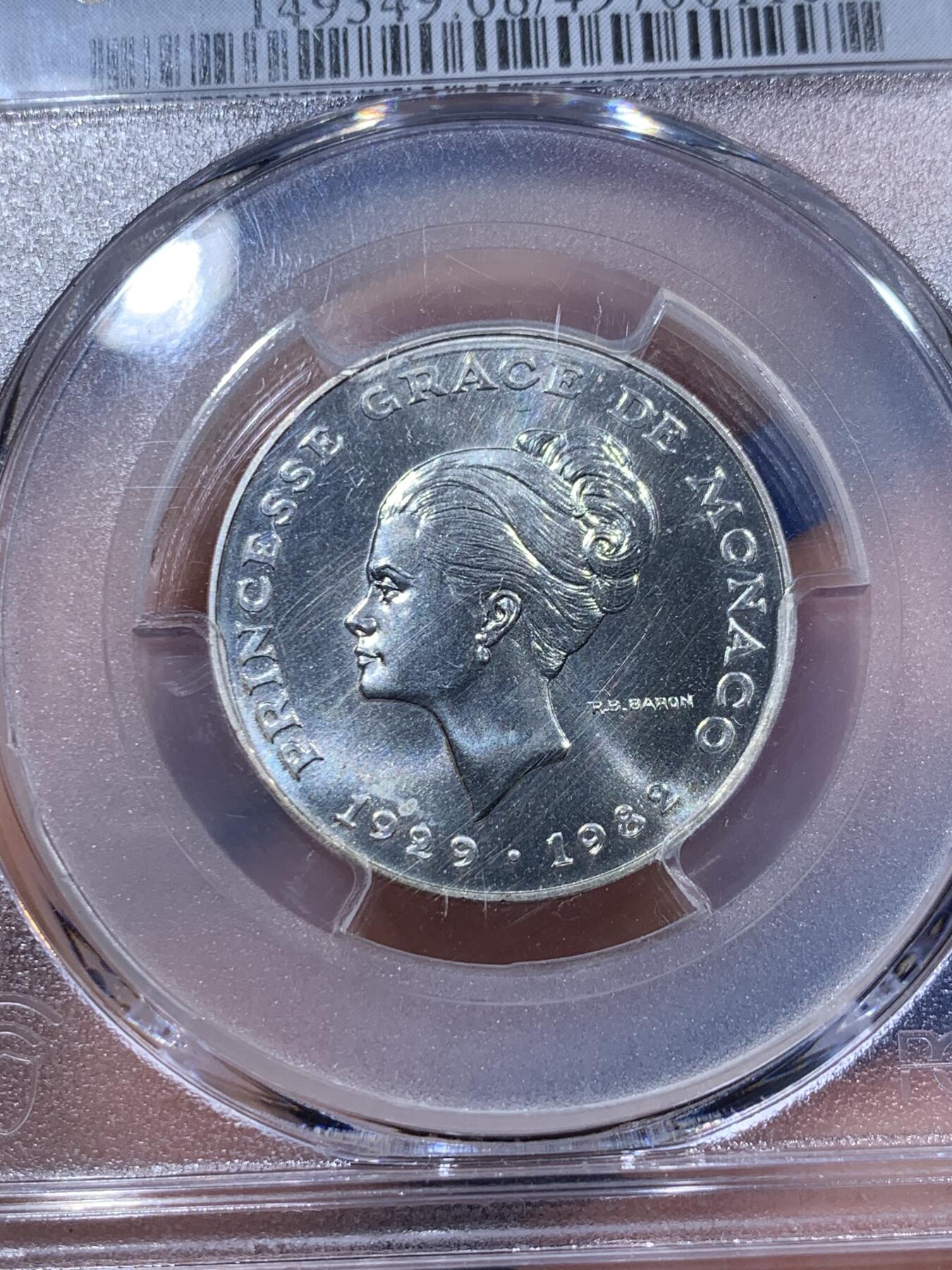 《竞宝斋》第373场 周日，周一，周二 3场连拍 （全场包邮） PCGS SP68 摩纳哥1982年格蕾丝王妃10法郎银样币，标注ESSAI。格蕾丝.凯莉，奥斯卡影后，风华绝代的传奇王妃。此银样很难出顶级分数，此枚68分为亚军分，更高分仅有2枚，平台此前上拍过的最高分仅有67