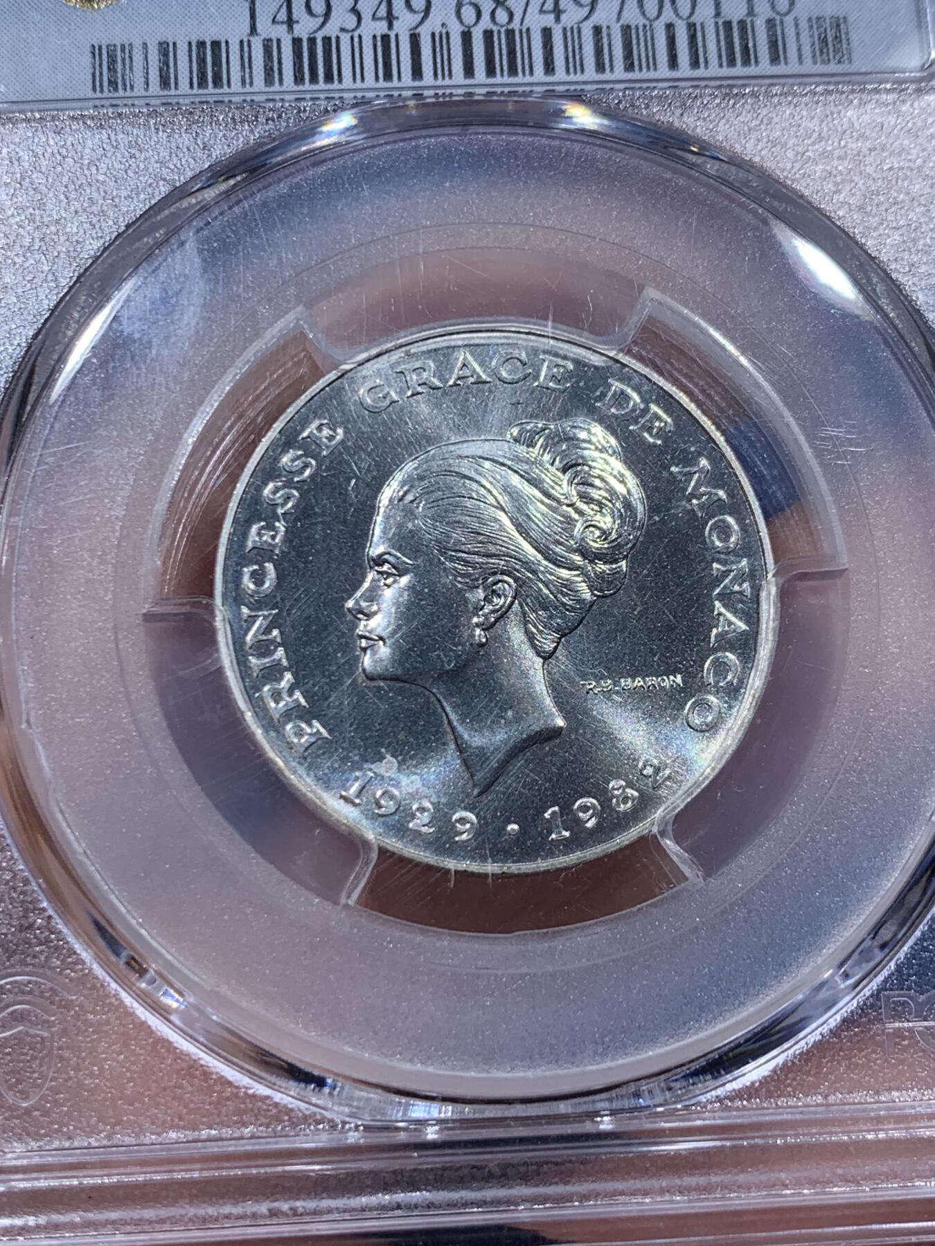 《竞宝斋》第373场 周日，周一，周二 3场连拍 （全场包邮） PCGS SP68 摩纳哥1982年格蕾丝王妃10法郎银样币，标注ESSAI。格蕾丝.凯莉，奥斯卡影后，风华绝代的传奇王妃。此银样很难出顶级分数，此枚68分为亚军分，更高分仅有2枚，平台此前上拍过的最高分仅有67