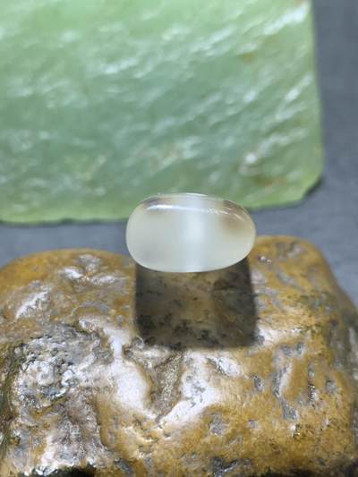 高玉化冰透草花纹海洋玉髓随形通货牙形吊坠一个 高玉化冰透草花纹海洋玉髓随形通货牙形吊坠一个