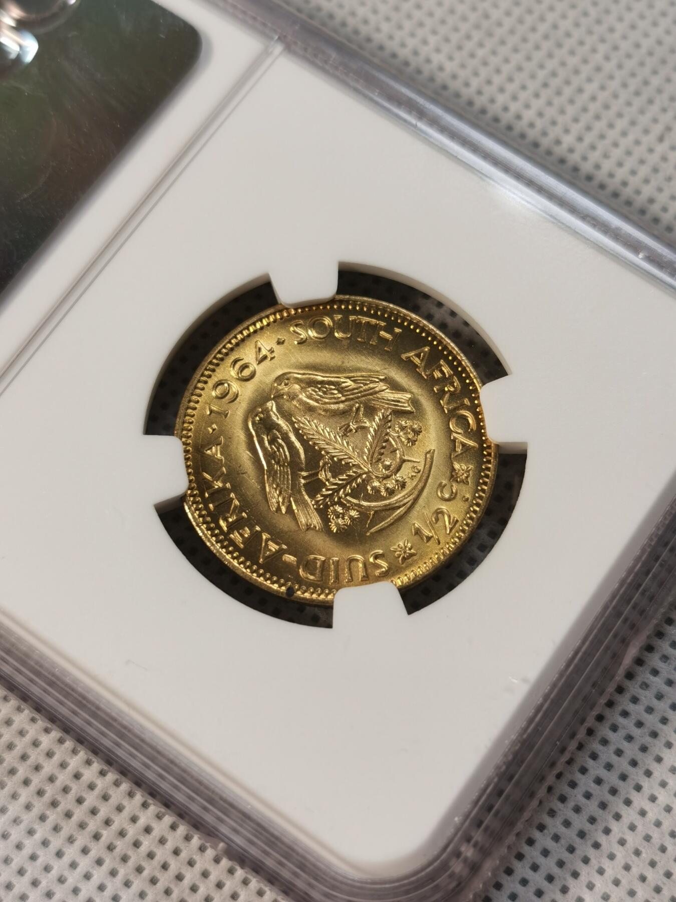  甄臻铺-世界币章拍卖（第14期）送拍享返佣金等优惠多多 NGC-MS67 南非 1964 1/2分 吕贝克铜币 币面转光，铜光耀眼