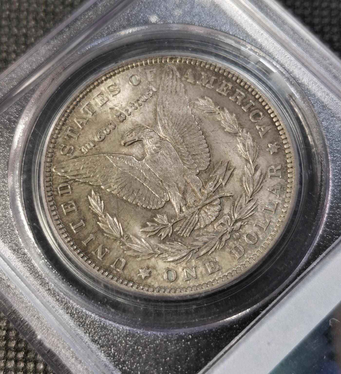  甄臻铺-世界币章拍卖（第14期）送拍享返佣金等优惠多多 NGC-MS64 美国1884年摩根银币O版，原汁原味五彩老包浆，打制精美，状态一流，P盒老白盒严评