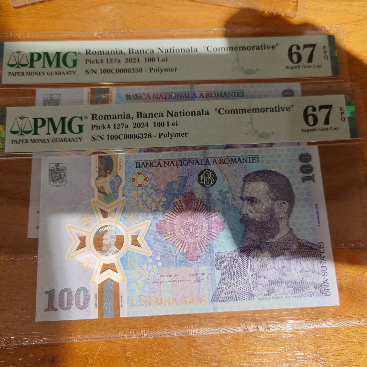 2024年罗马尼亚100列依纪念钞 PMG67E无47
