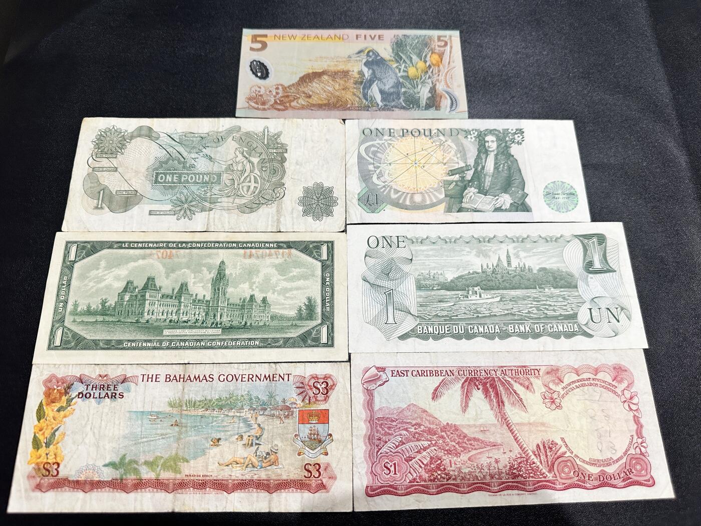 《外钞收藏家》第五百一十七期（五一假期畅拍场）（本平台长期征集拍品、欢迎联系） 新西兰、英国、加拿大、巴哈马、东加勒比 7张一起 非全新 品相如图