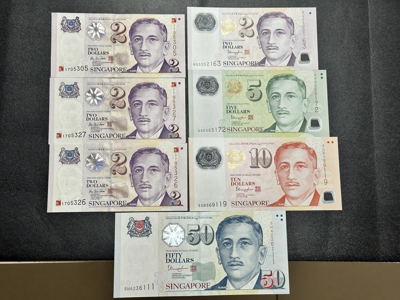 《外钞收藏家》第五百一十七期（五一假期畅拍场）（本平台长期征集拍品、欢迎联系） 新加坡2-50元 纸钞和塑料钞 7张一起 全新UNC
