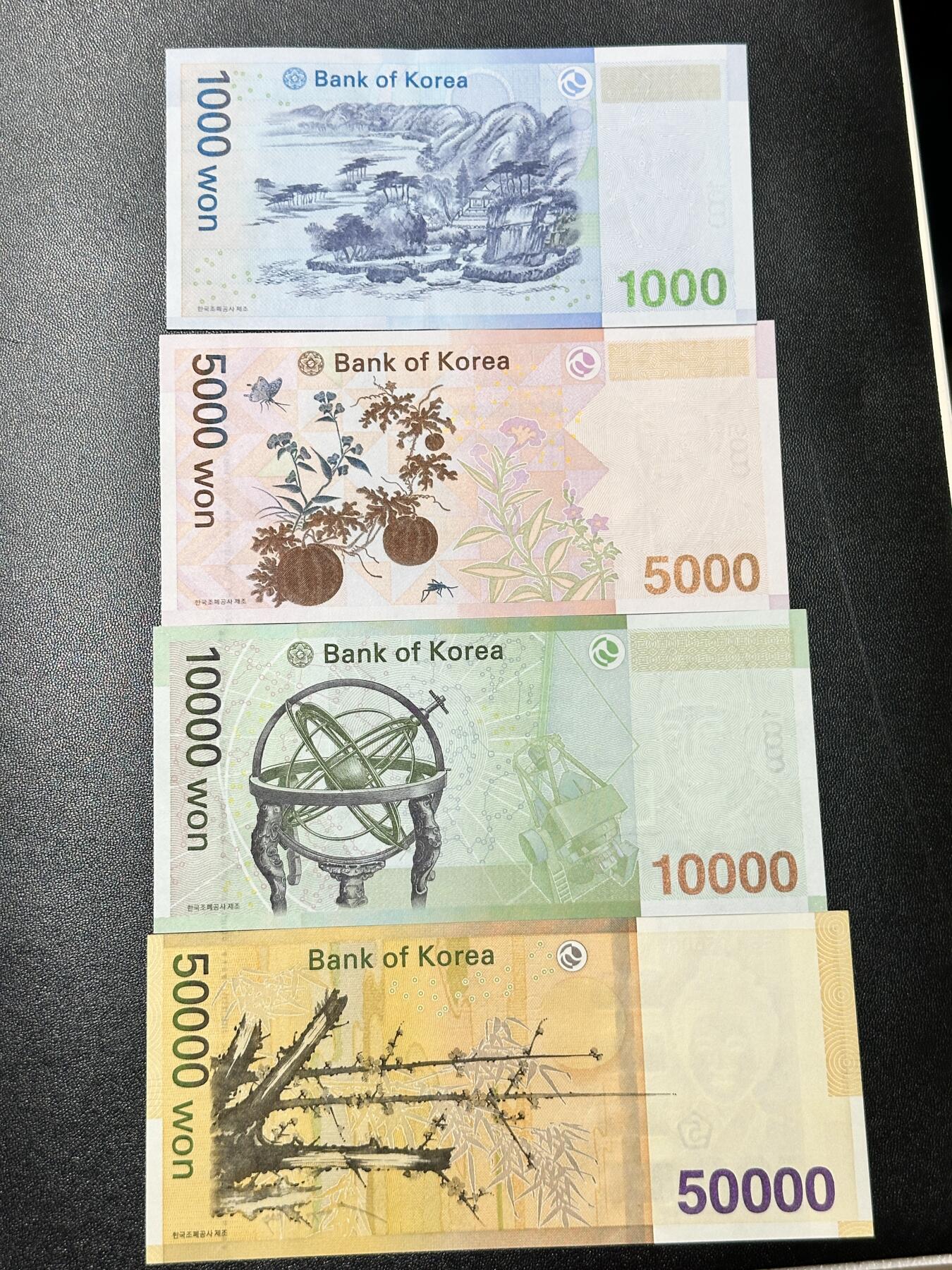 《外钞收藏家》第五百一十七期（五一假期畅拍场）（本平台长期征集拍品、欢迎联系） 韩国流通版 1000-5万韩元 四张一起 全新UNC