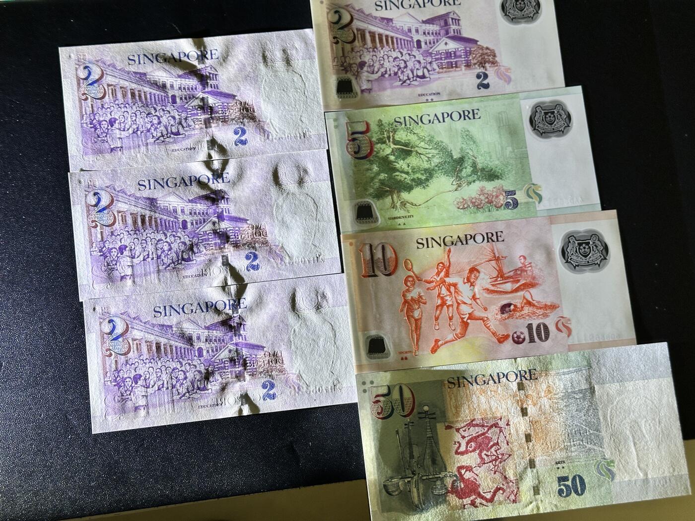 《外钞收藏家》第五百一十七期（五一假期畅拍场）（本平台长期征集拍品、欢迎联系） 新加坡2-50元 纸钞和塑料钞 7张一起 全新UNC