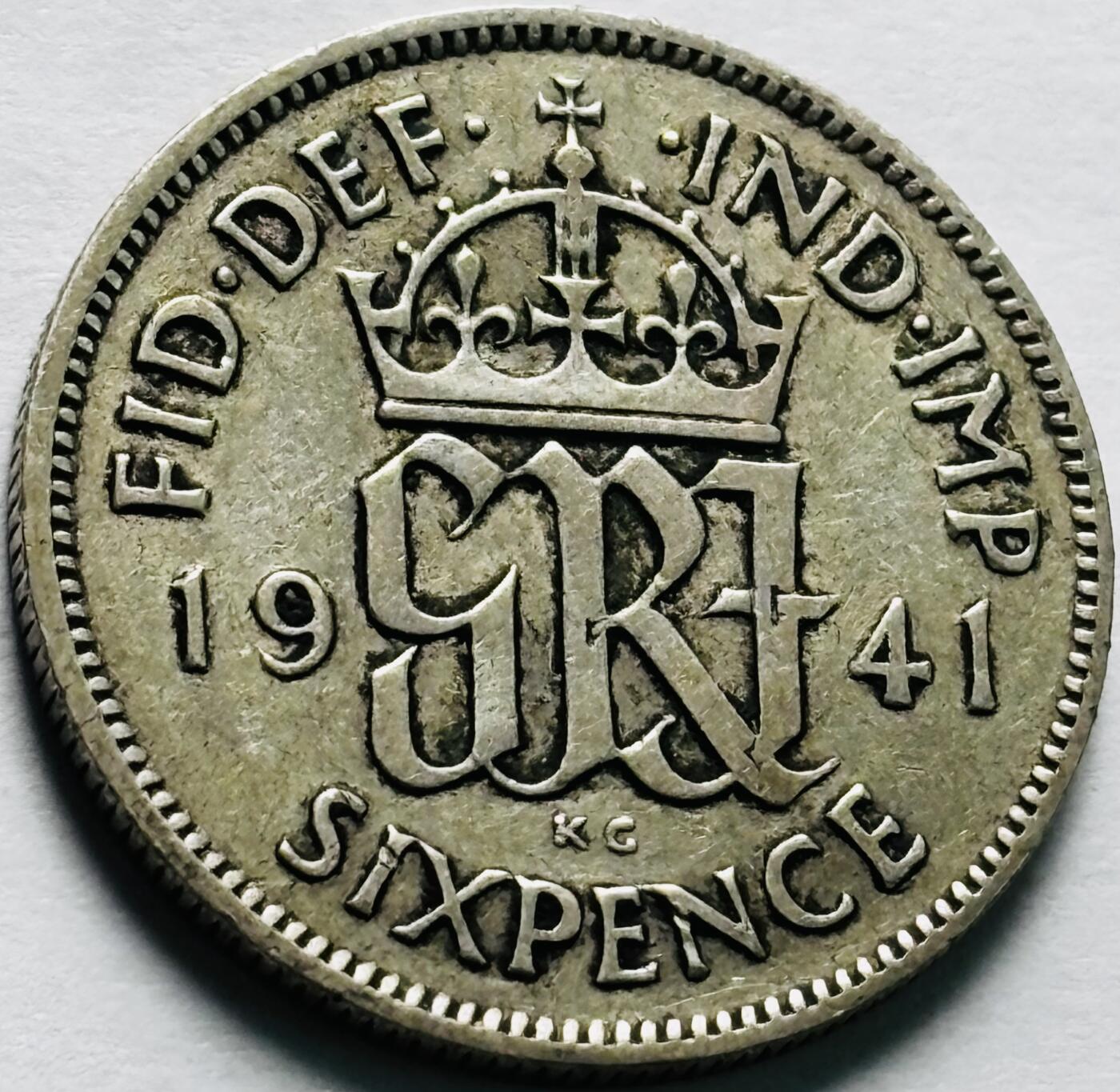 文馨钱币收藏第 240 场，各国老铜币，欢迎关注 1941 年英国乔治六世 6 便士银币