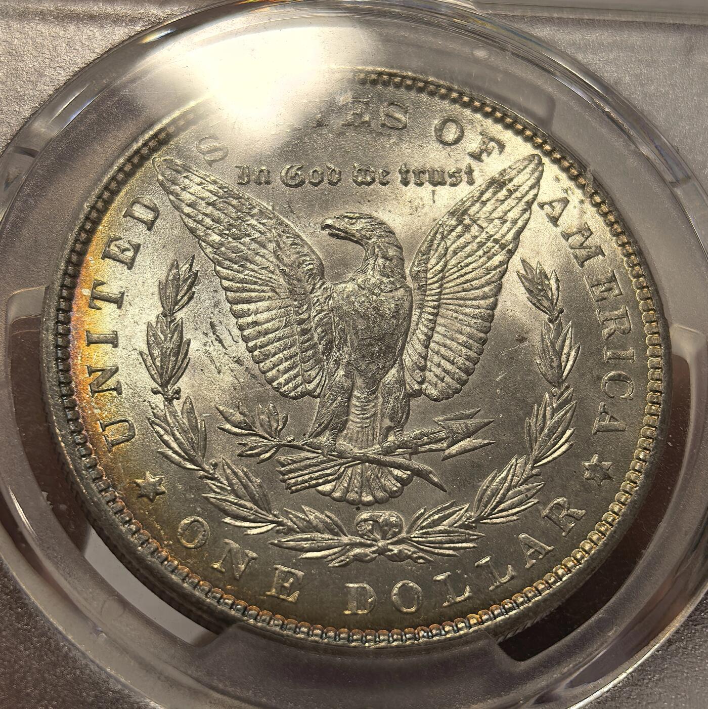 博洋堂“春风得意”四月精品专场暨第120期（全场包邮） PCGS MS63 美国1888年摩根银币，正面卷首极品五彩，背面带大面积环彩，丝绸转光，吉祥特年，自藏级美彩。