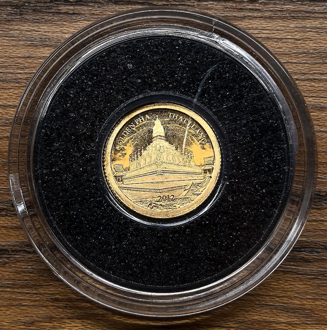 凡希社世界钱币微拍第三百零二期 2012老挝大金塔500KIP小金币，0.5g，999金。
